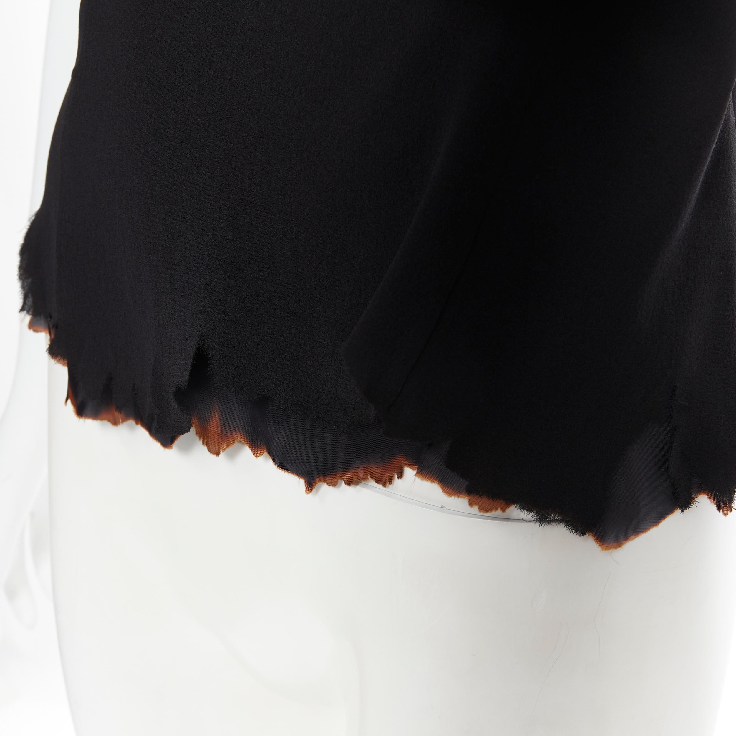 new MAISON MARGIELA 2005 Vintage black silk fire burnt hem camisole top IT42 
Reference: TGAS/B00315 
Brand: Maison Margiela 
Designer: Martin Margiela 
Collection: AD2005 
Material: Silk 
Color: Black 
Pattern: Solid 
Closure: Zip 
Extra Detail: