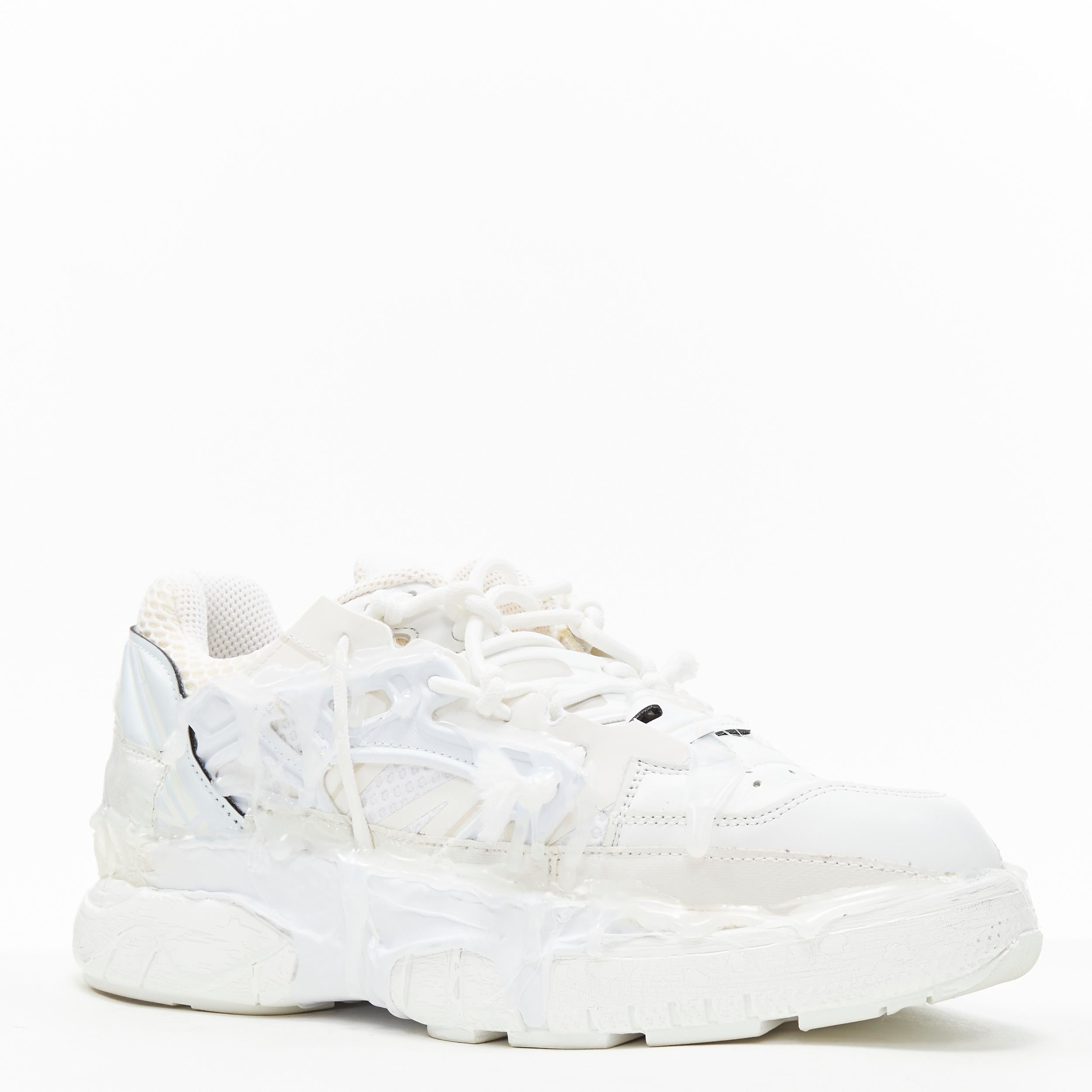 new MAISON MARGIELA Fusion white deconstructed glue covered low top sneaker EU39 
Reference: TGAS/B01196 
Brand: Maison Margiela 
Model: Fusion Sneaker Triple White 
Material: Fabric 
Color: White 
Pattern: Solid 
Closure: Lace Up 
Extra Detail: