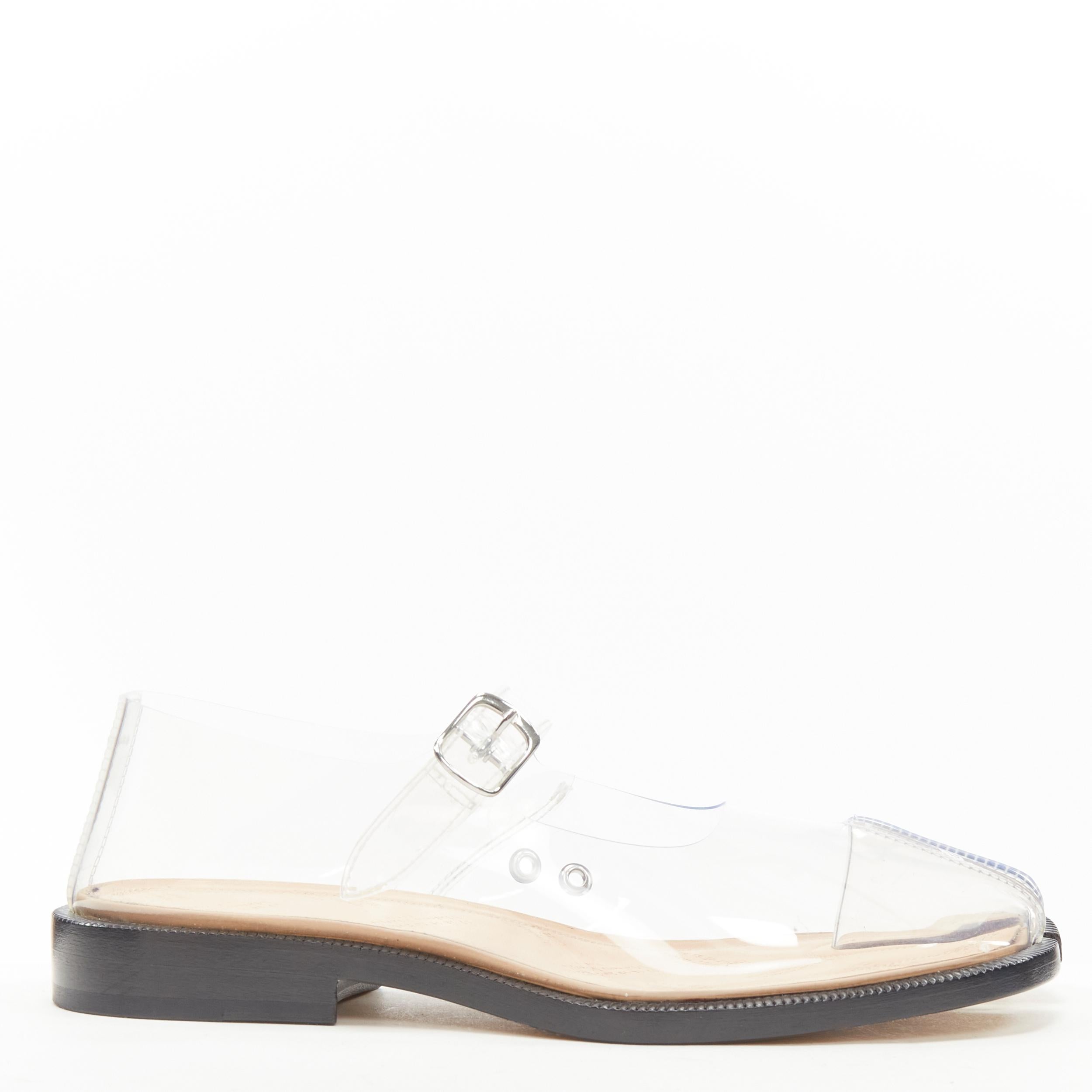 new MAISON MARGIELA Tabi PVC transparent clear mary jane flats EU37 
Reference: TGAS/C00639 
Brand: Maison Margiela 
Designer: John Galliano 
Model: Tabi 
Material: Plastic 
Color: Clear 
Pattern: Solid 
Closure: Ankle Strap 
Extra Detail: PVC