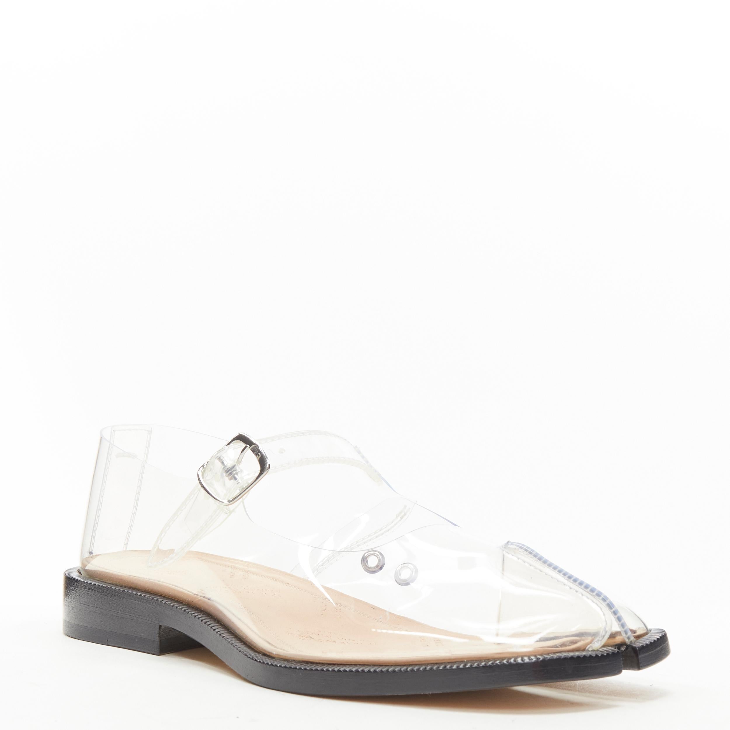new MAISON MARGIELA Tabi PVC transparent clear mary jane flats EU38 
Reference: TGAS/C00638 
Brand: Maison Margiela 
Designer: John Galliano 
Model: Tabi 
Material: Plastic 
Color: Clear 
Pattern: Solid 
Closure: Ankle Strap 
Extra Detail: PVC