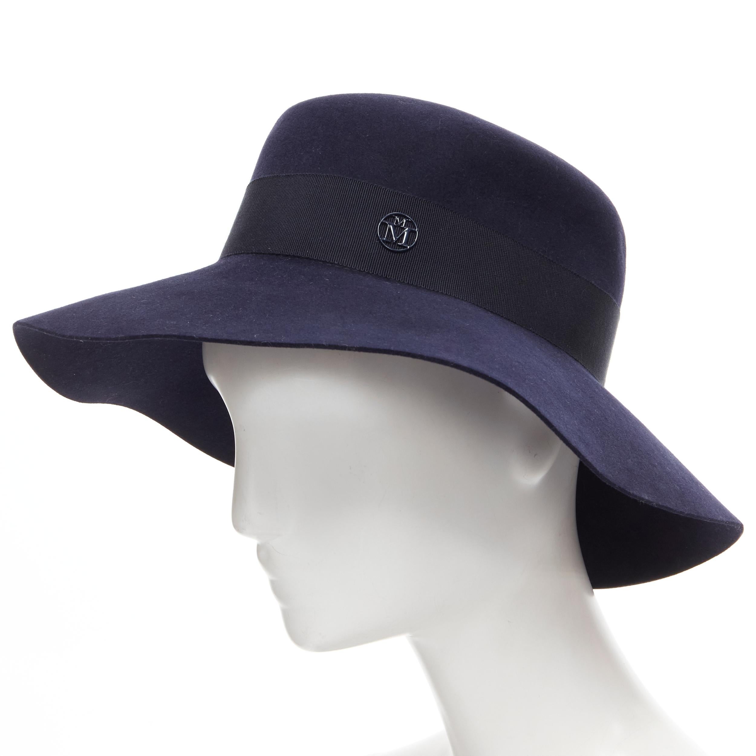 new MAISON MICHEL navy blue black grosgrain M logo detail fedora hat S 56cm 
Reference: MELK/A00157 
Brand: Maison Michel 
Material: Wool 
Color: Navy 
Pattern: Solid 

CONDITION: 
Condition: New with tags. 

SIZING: 
Designer Size: International S