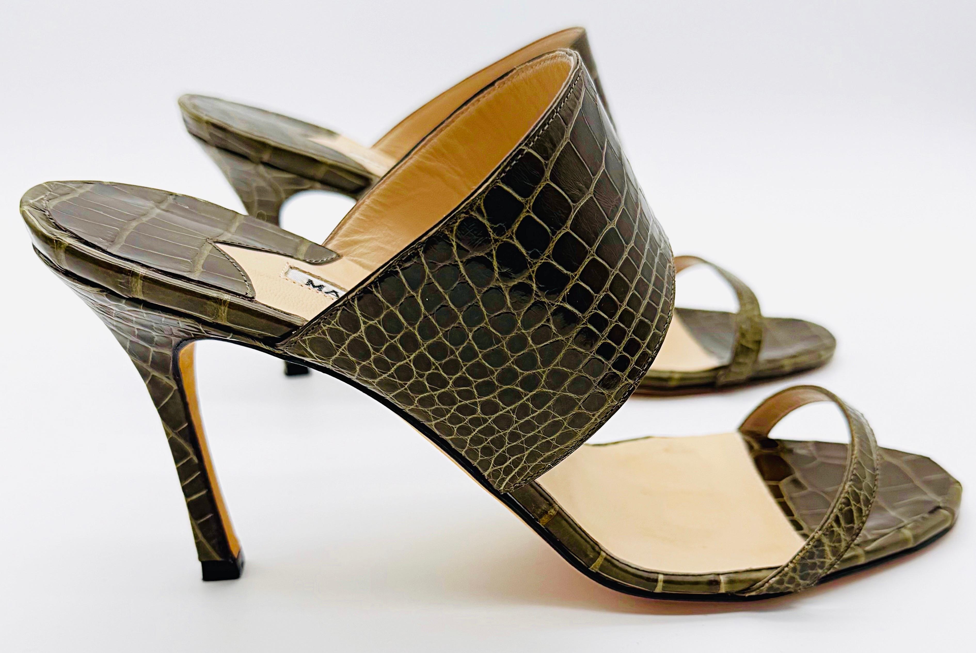 Brand new early 2000s Manolo Blahnik genuine alligator olive green high heel sandals ! Never worn (besides one photo shoot with tape on the soles), and retailed for $2,900 at Neiman Marcus in the early 2000s. Can easily be dressed up or down. Pair