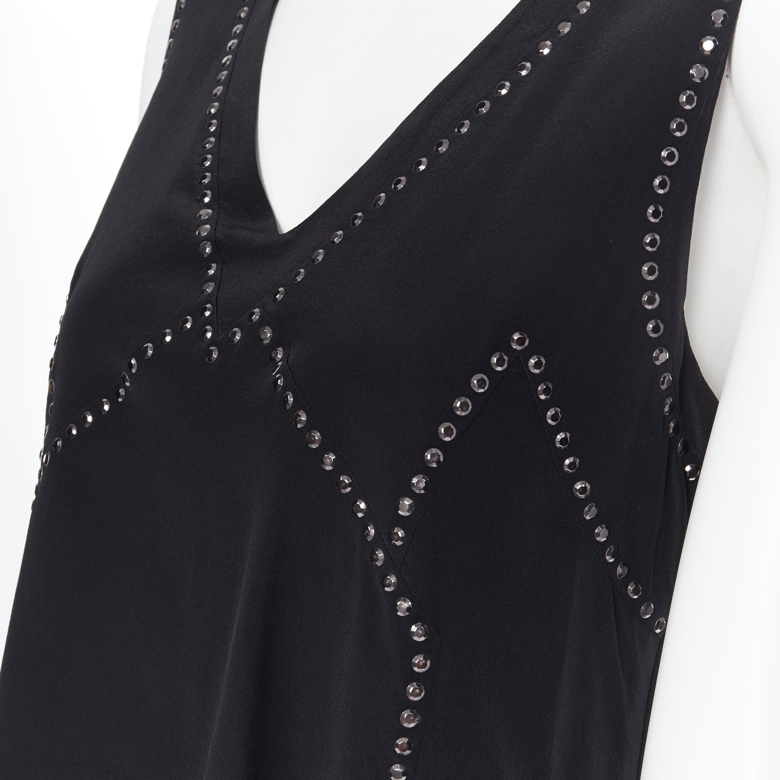 new MARC BY MARC JACOBS 100% black silk crystal embellished shell vest top S
Brand: Marc by Marc Jacobs
Model Name / Style: Silk top
Material: Silk
Color: White
Pattern: Solid
Closure: Button
Extra Detail: Tonal crystal embellishment.
Made in: