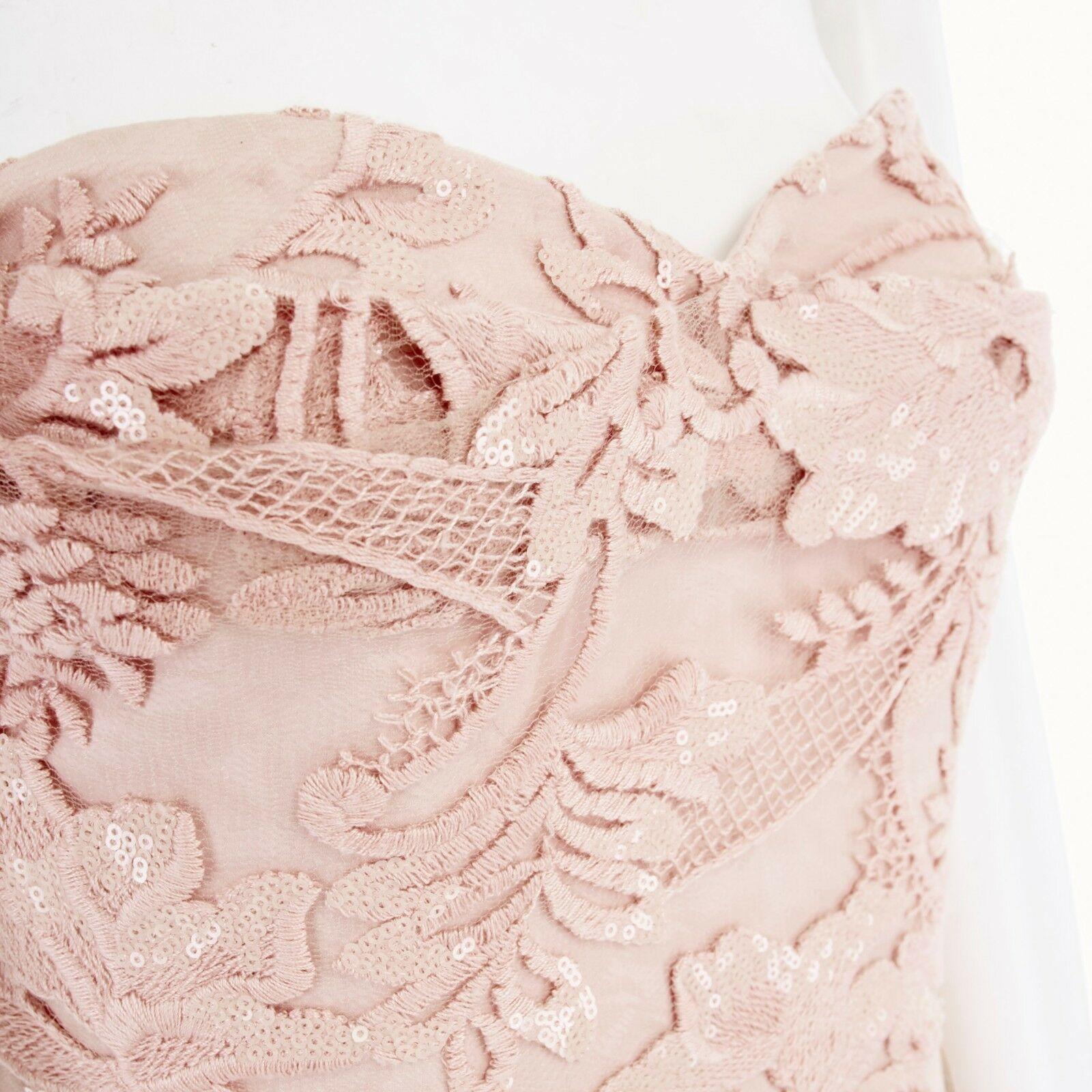 new MARCHESA NOTTE nude pink sequins embroidery lace belted gown dress US6 M

MARCHESA NOTTE
FROM THE PRE-FALL 2015 COLLECTION
Polyester, spandex, elastane . Nude pink . Floral embroidery on tulle . Tonal sequins embellished on various floral