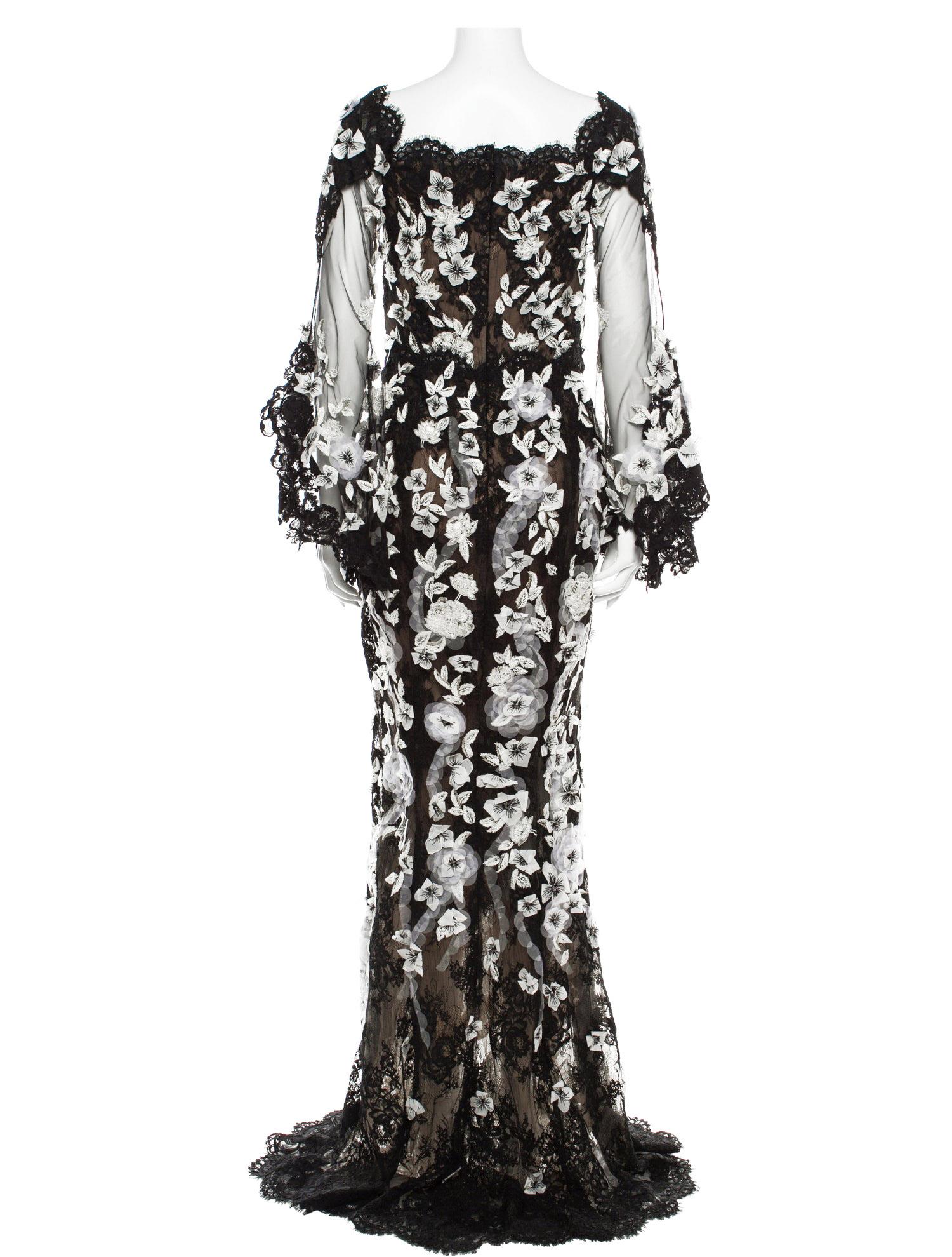 New Marchesa Runway Fully Embellished Long Dress Gown
Designer size 4
Pre-Fall 2019 Collection
White Handwork Applications, Micro-Beading, Crystals, Embroidery in White and Silver-tone Metallic Threads Over the Black Embroidered Tulle, Scalloped