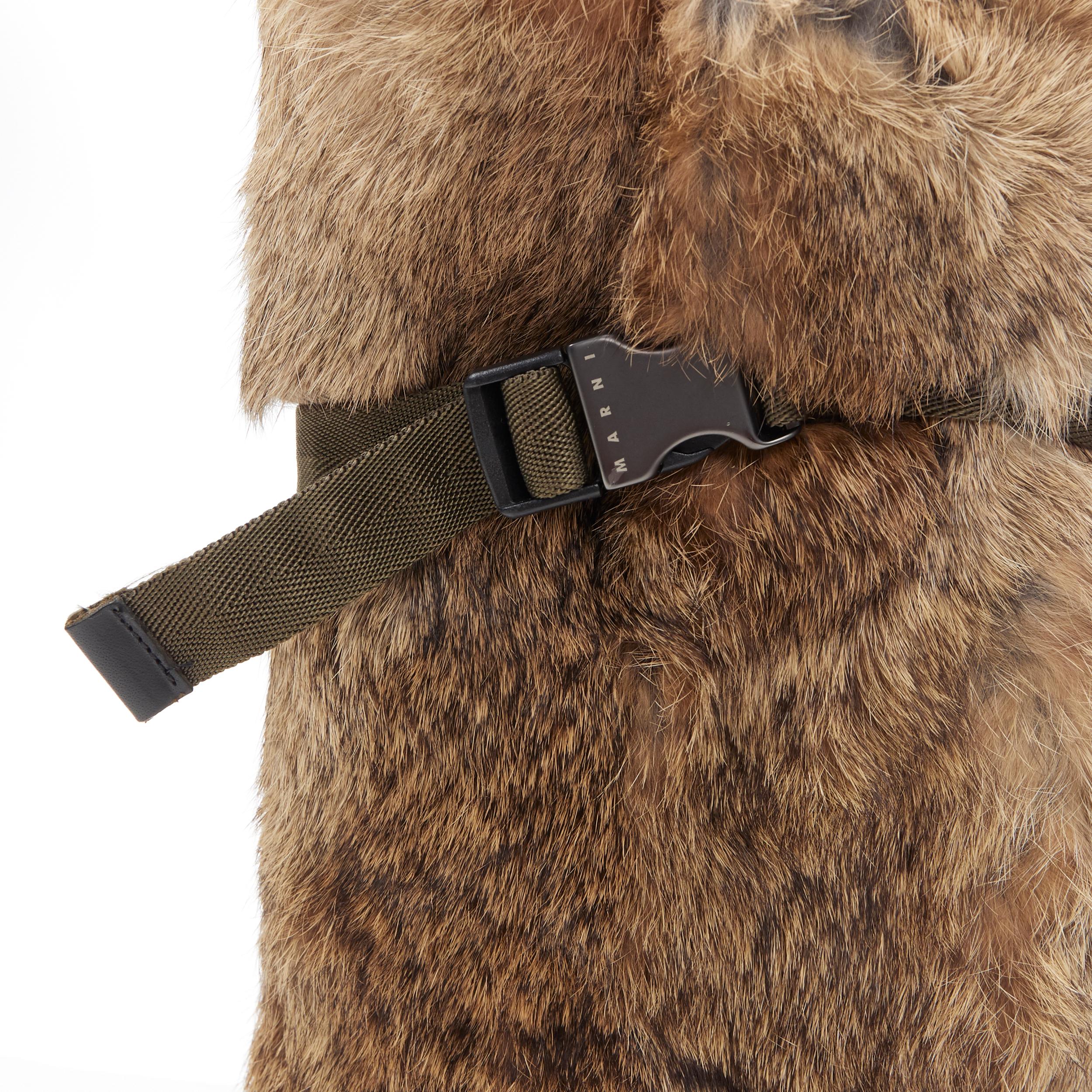 new MARNI brown rabbit fur green utility nylon buckle sole winter boot EU36.5 
Reference: JETI/A00061 
Brand: Marni 
Material: Fur 
Color: Brown 
Pattern: Solid 
Closure: Buckle 
Extra Detail: Genuine fur. Heavy duty lug sole. Flat (Under 1 in) heel