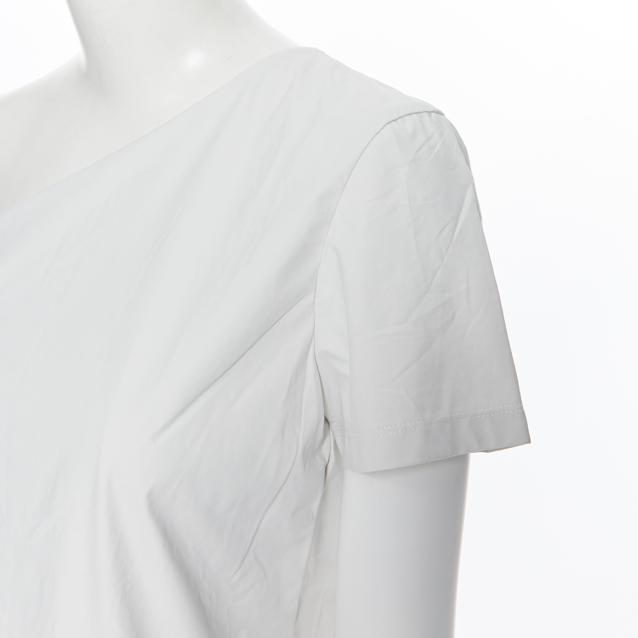 new MAX MARA white coated cotton one shoulder asymmetric top S 
Brand: Max Mara
Model Name / Style: One shoulder top
Material: Cotton
Color: White
Pattern: Solid
Extra Detail: Coated cotton fabrication. Asymmetric one shoulder neckline. Short