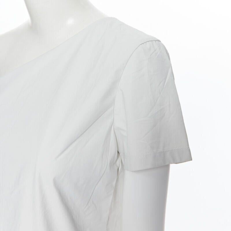new MAX MARA white coated cotton one shoulder asymmetric top S
Reference: SNKO/A00124
Brand: Max Mara
Material: Cotton
Color: White
Pattern: Solid
Extra Details: Coated cotton fabrication. Asymmetric one shoulder neckline.
Made in: