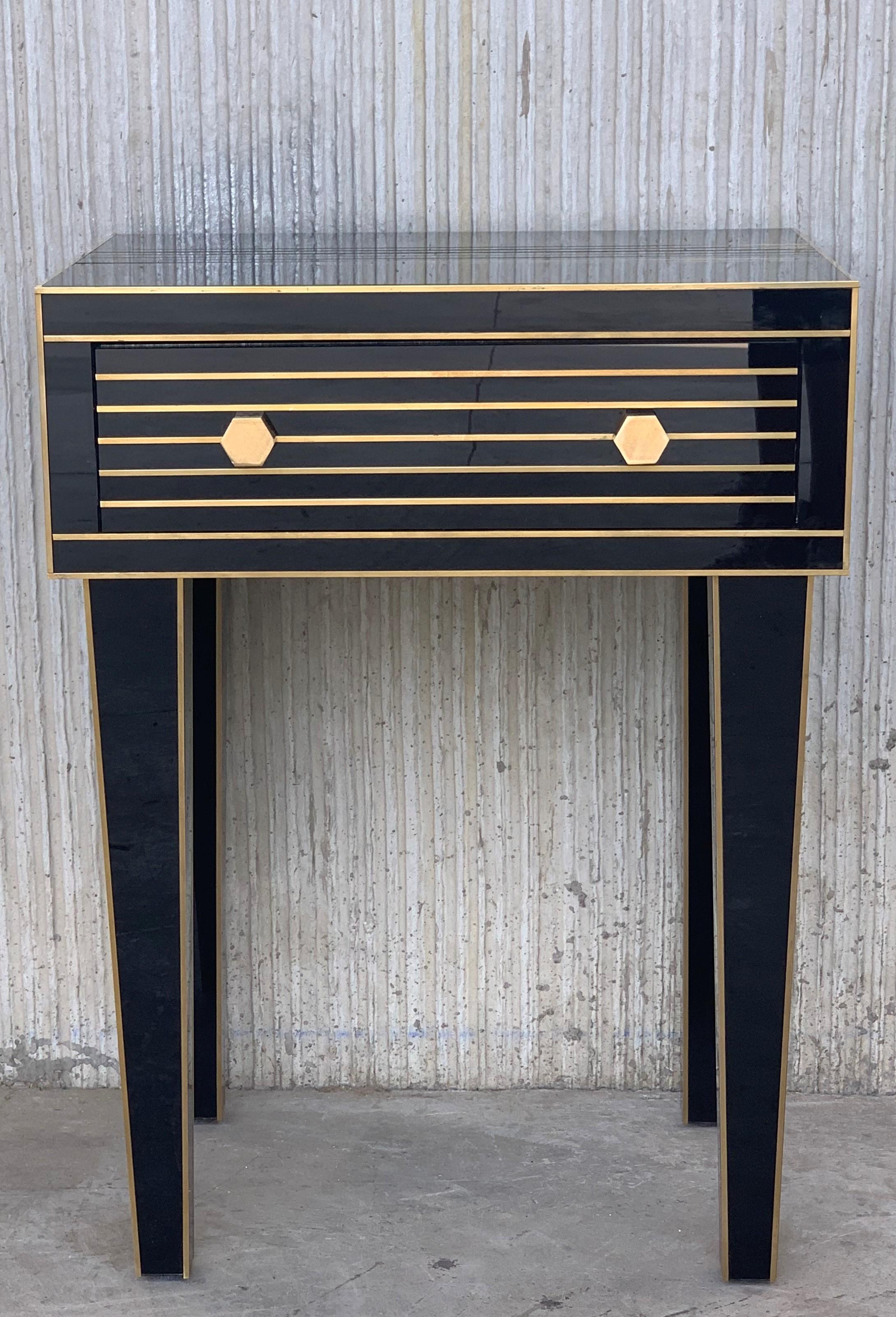 black nightstand with mirrored drawers