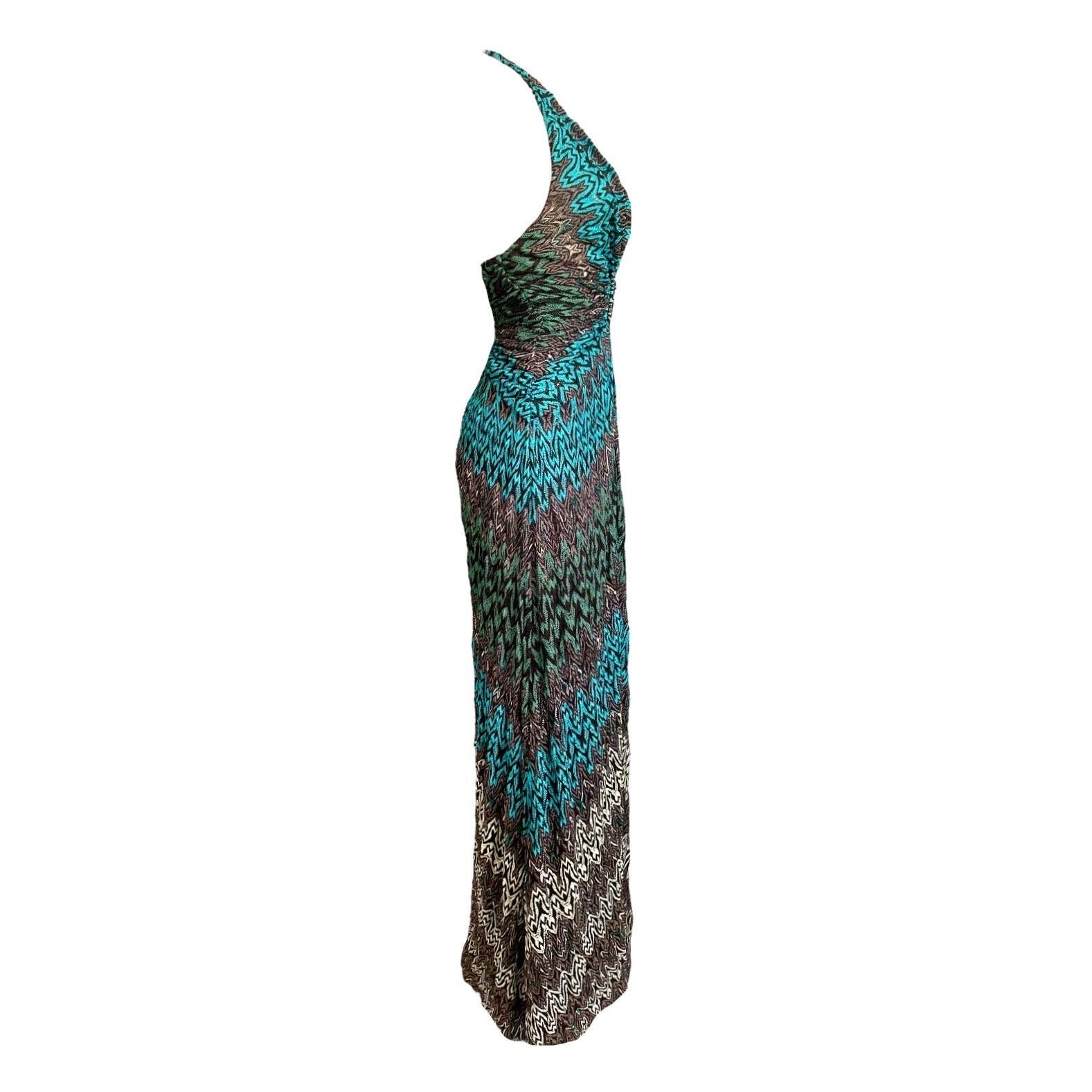 A very unique and sexy evening gown by Missoni - make an entrance with this stunning piece!

DETAILS:

A fantastic Missoni Crochet Knit Evening Gown Ensemble
Consisting of 2 pieces - the gown and matching cardigan
MISSONI main line
Classic MISSONI