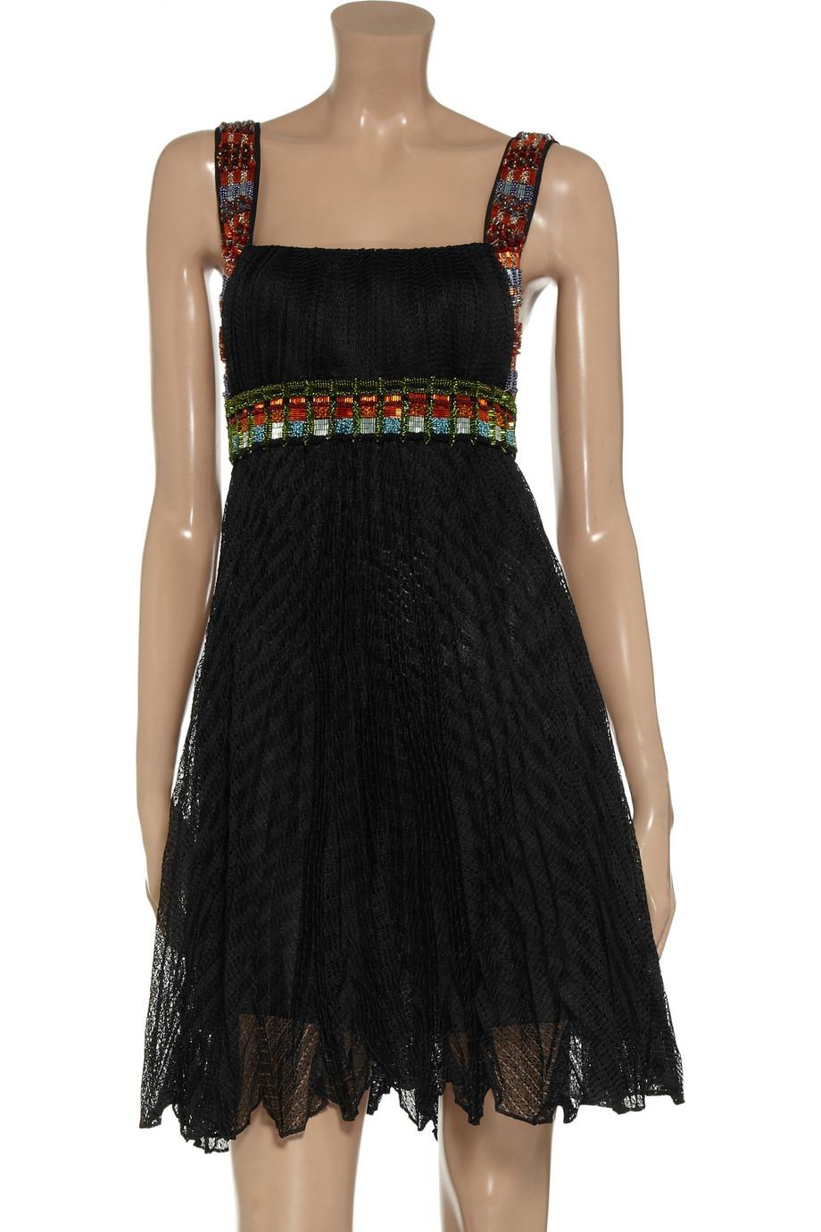 

    Beautiful multicolor MISSONI dress 
Classic MISSONI signature crochet-knit
Empire-line style
Pleated skirt

Concealed hook and snap fastenings along back
    Decorative bead-embellishing on straps and below bust
    Crochet-knit