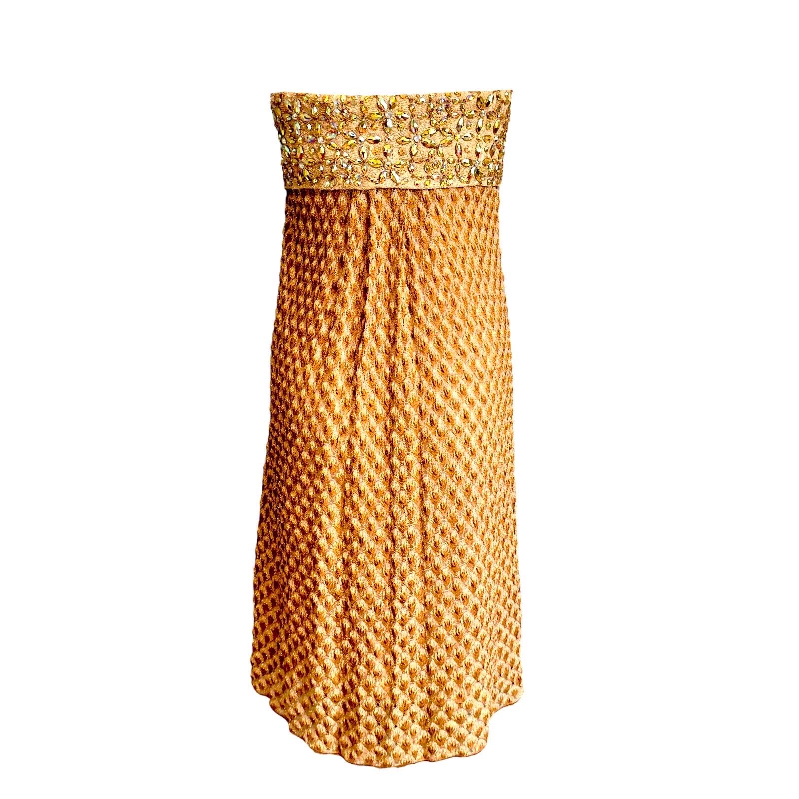 A stunning evening gown by MISSONI - a rare find!
Perfect a glamorous evening
Midi length
Golden shades with metallic lurex threads for a shimmering look
Bustier corset top for a perfect fit
Embellished upper part with crystals
Beautiful MISSONI