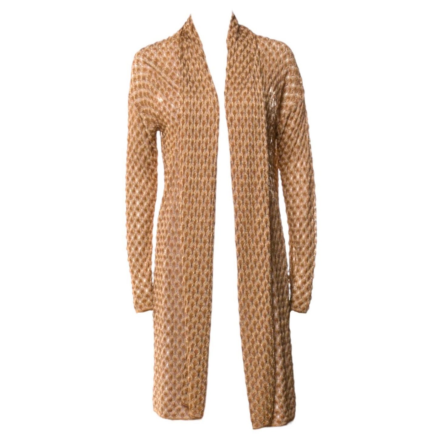 Cardigan Missoni in maglia all'uncinetto
Meravigliosi colori metallizzati oro
Etichetta principale Missoni
Si infila semplicemente
È così versatile: abbinalo a qualsiasi vestito o indossalo come abito con una sottoveste e una cintura!
Solo lavaggio