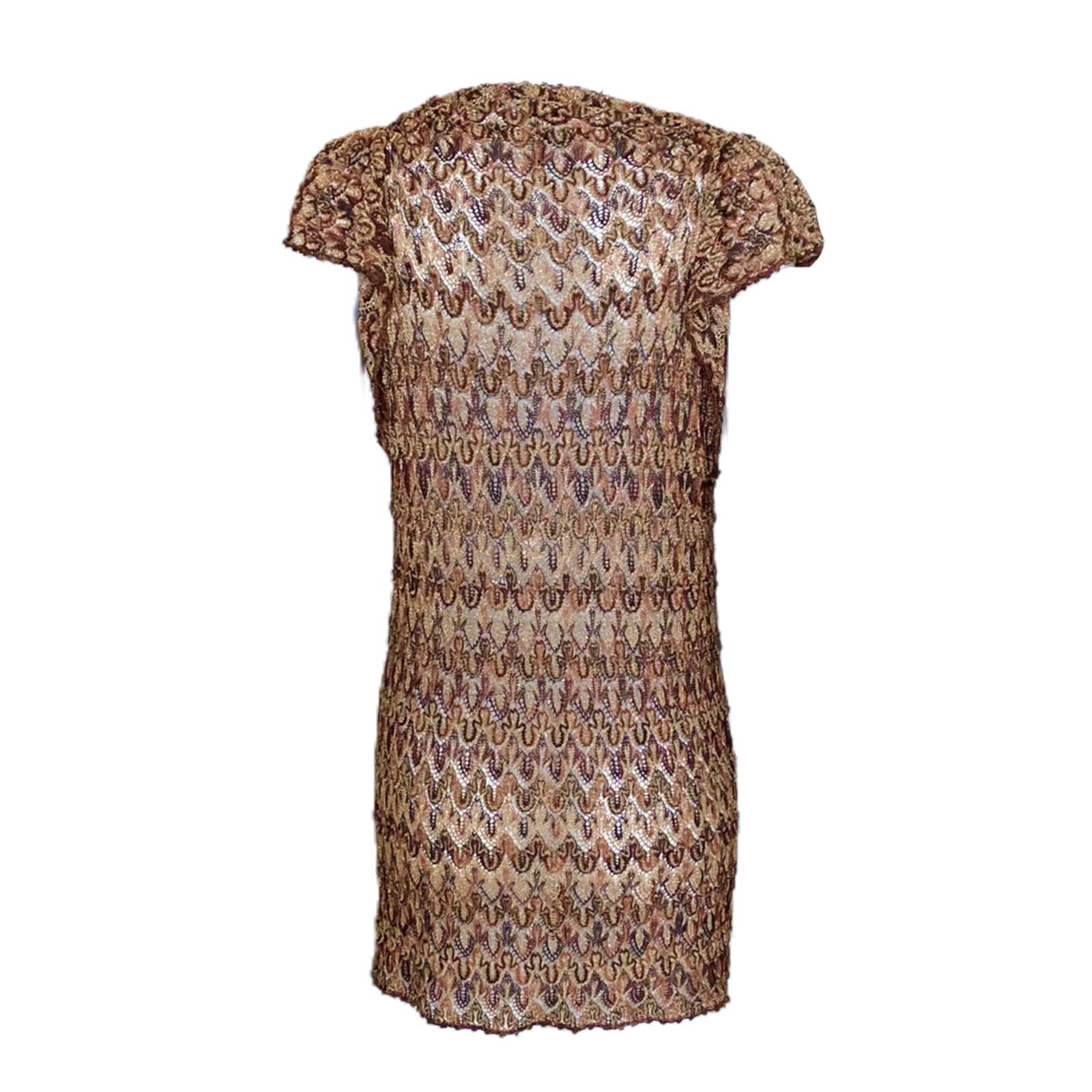 A signature Missoni knit dress in golden metallic colors is the only dress you'll need. Missoni's mini dress is an effortless way to wear the brand's signature crochet knit. 

Missoni signature crochet knit pattern
Stunning golden metallics
Draped