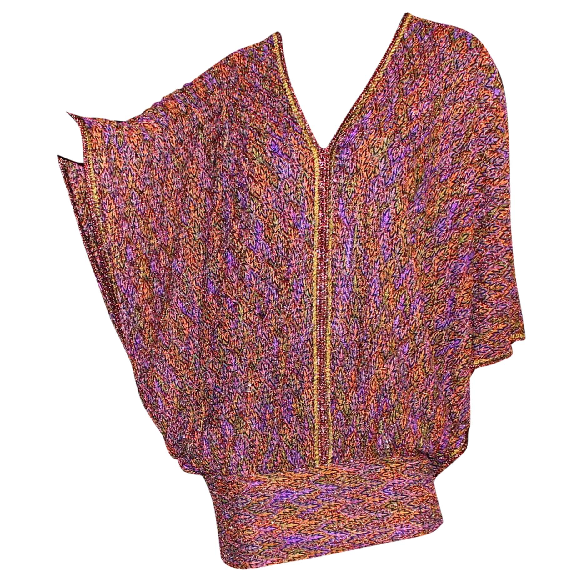 Beautiful multicolored lurex MISSONI kaftan dress
Classic MISSONI signature knit
Simply slips on
V-Neck
Batwing sleeves
Crochet-knit details - so beautiful!
Dry Clean only
Made in Italy
Size 44
New, unworn