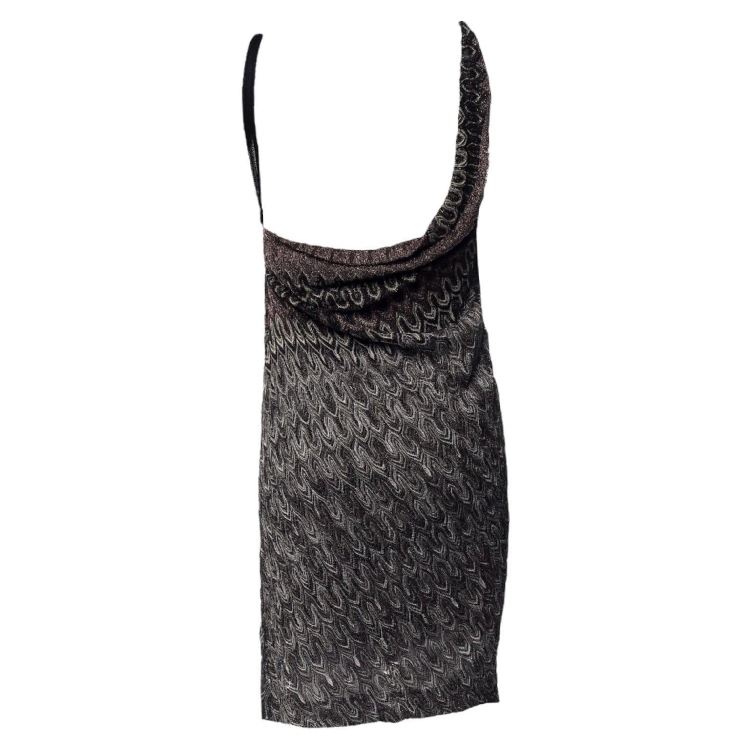 A signature Missoni knit dress in metallic colors is the only dress you'll need. Missoni's dress is an effortless way to wear the brand's signature crochet knit. 

Cut a stylish silhouette in Missoni's multicolored Lurex-knit dress with draped