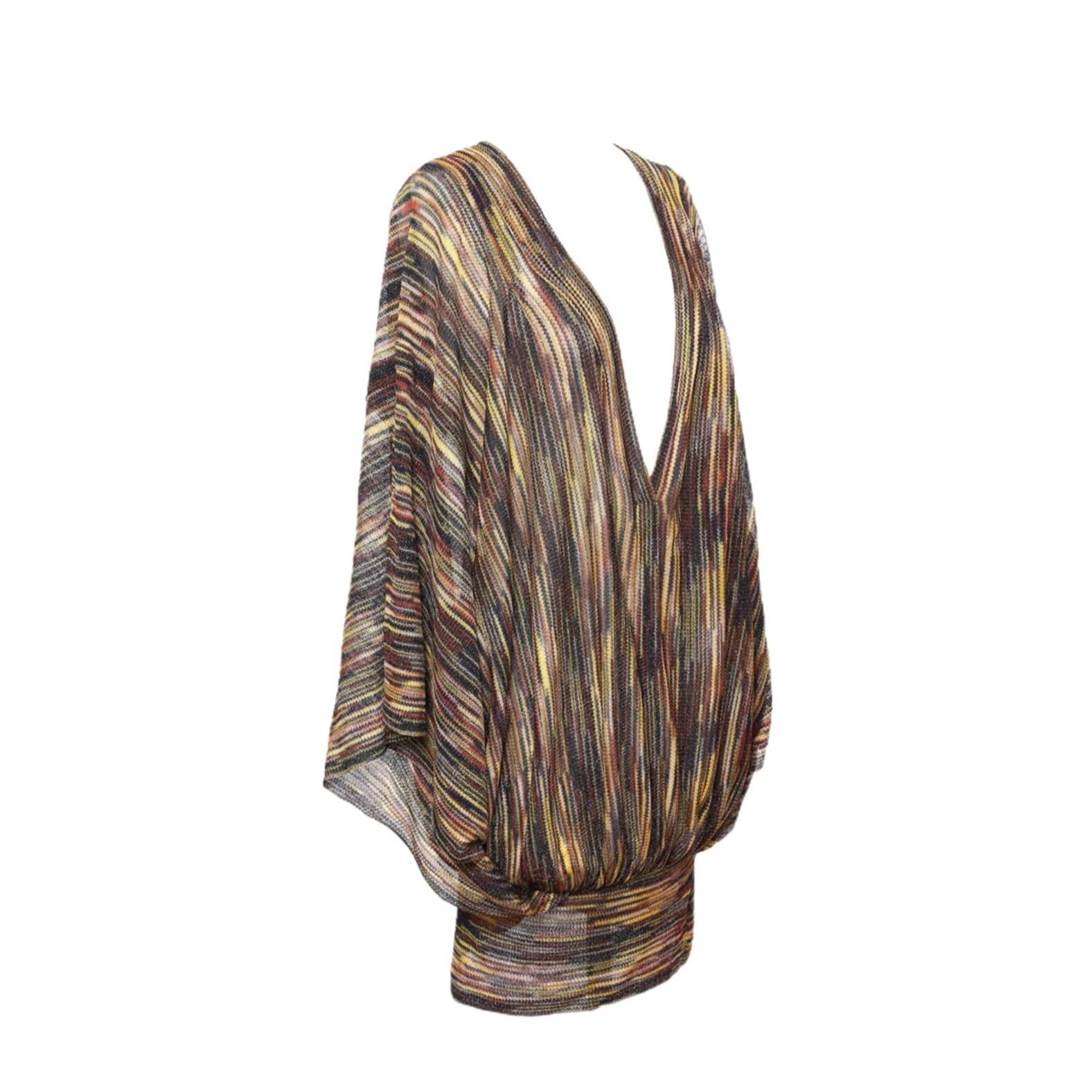 Even knits go metallic this season with molten accents woven through sweaters and cardigans. Tap into the trend with Missoni's lurex striped batwing tunic, a glamorous day-to-evening piece.

Metallic stripe knit 
Beautiful colors with silver