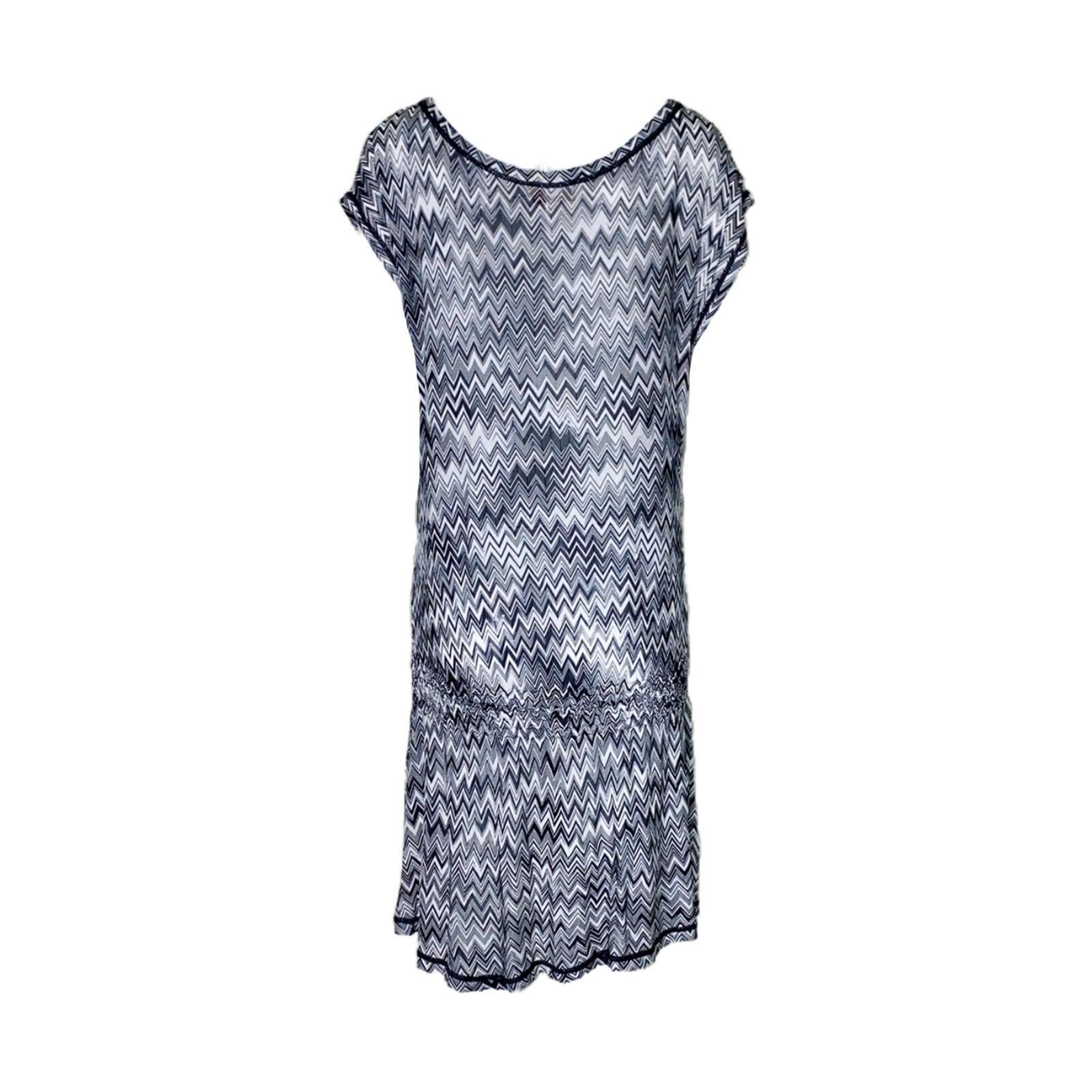 
Missoni's semi-sheer dress has been crafted in Italy using the label's signature crochet-knit technique. The relaxed shape makes it perfect for slipping on over a bikini or to dress it up with heels for a night out.


Missoni signature black and