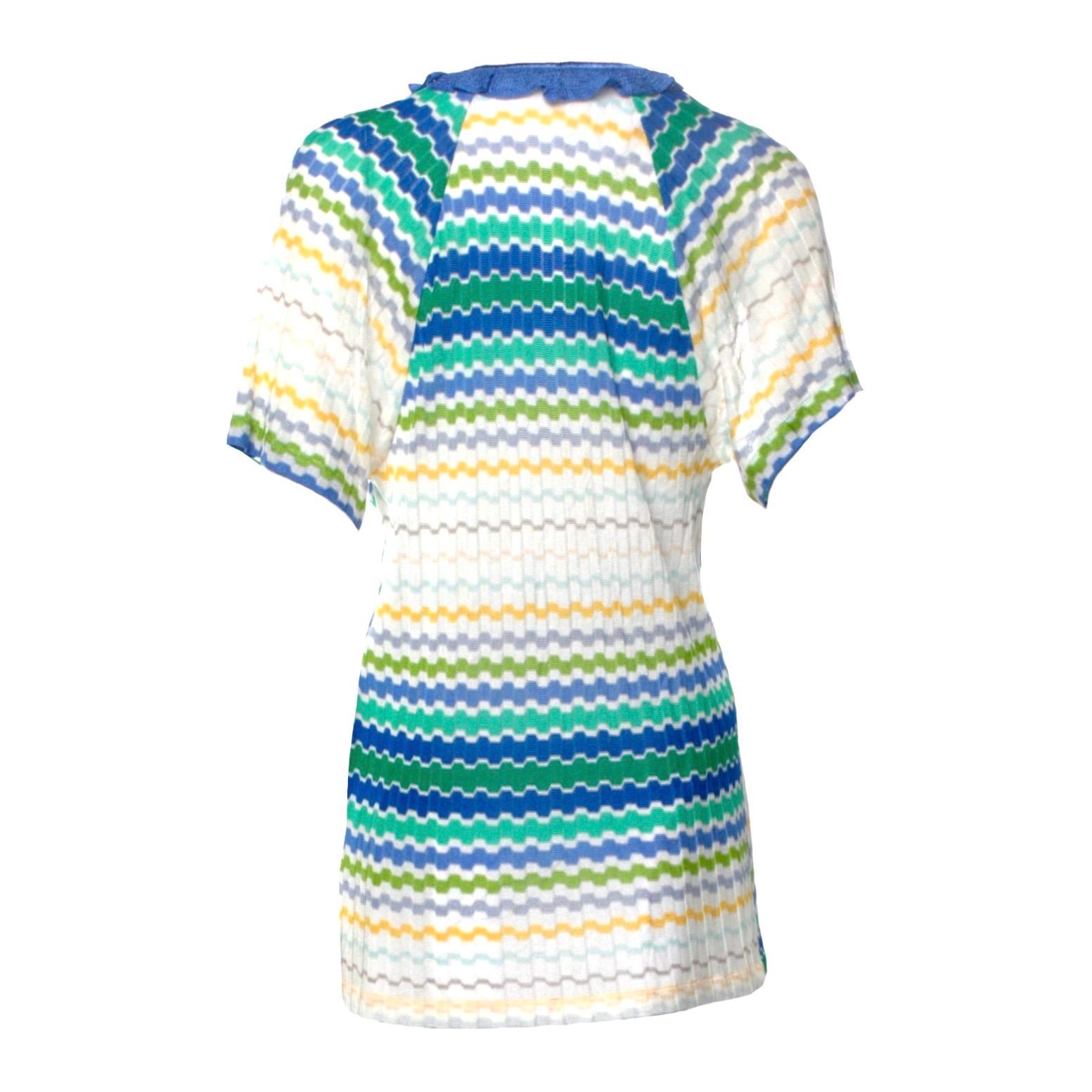 This colorful Missoni signature crochet-knit tunic is designed for a sexy summer day. It the perfect mini piece for sun-soaked days on the beach. Throw it over your bikini for a stylish lunch or team it heels for a cool dinner look.


Beautiful