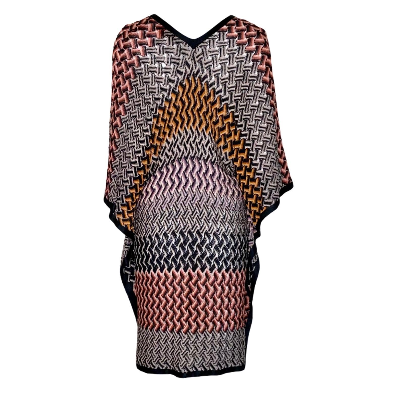 A signature Missoni knit caftan in a cascade of colors is the only piece you'll need this summer season

Multicolored knitted Missoni kaftan in beautiul colors
Plunging V-neckline
Simply slips on
Made in Italy
Dry Clean Only
Size 40
New &