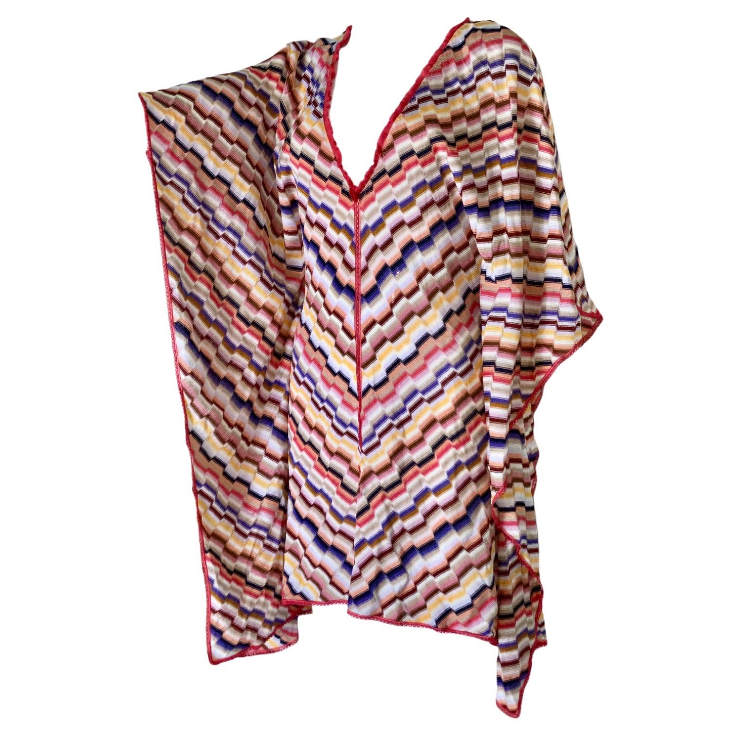 A signature Missoni knit caftan in a cascade of colors is the only piece you'll need this summer season

Multicolored knitted Missoni kaftan in beautiful pink colors
Plunging V-neckline
Simply slips on
Made in Italy
Dry Clean Only
Size S
New &