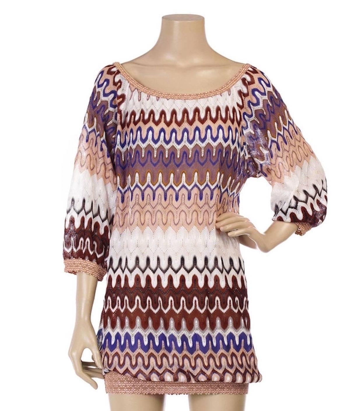 Stunning dress from MISSONI main line
Beautiful shades
Classic MISSONI signature zigzag crochet knit
Simply slips on
Bateau neck
Contrast trim
Elasticated neck and hem
100% Rayon
Dry Clean only
Size 40
New, unworn