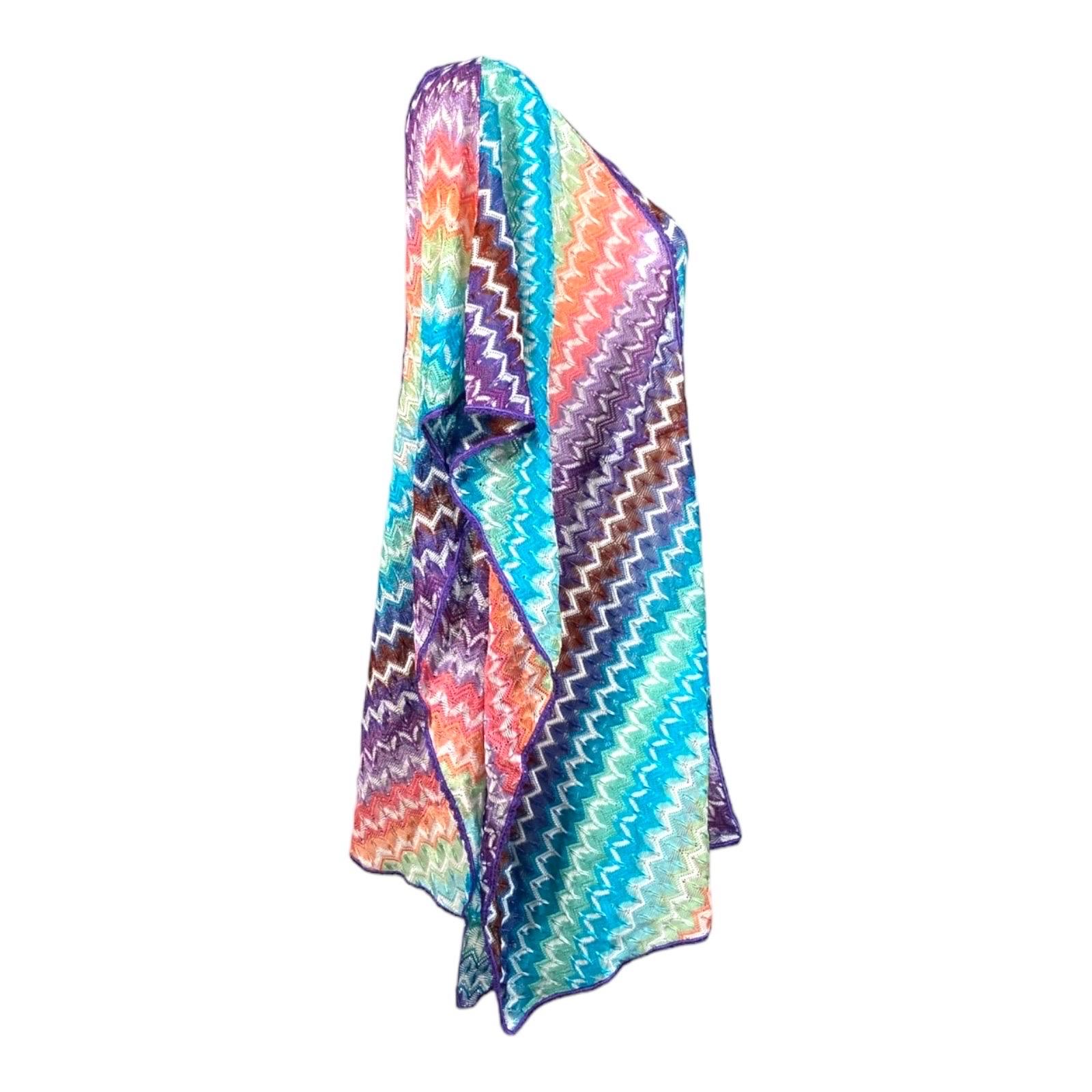 A signature Missoni knit caftan in a rainbow of colors is the only coverup you'll need this summer season

Multicolored knitted Missoni kaftan in beautiul pastels
Drawstring detail at waist for a perfect fit
Simply slips on
Made in Italy
Dry Clean