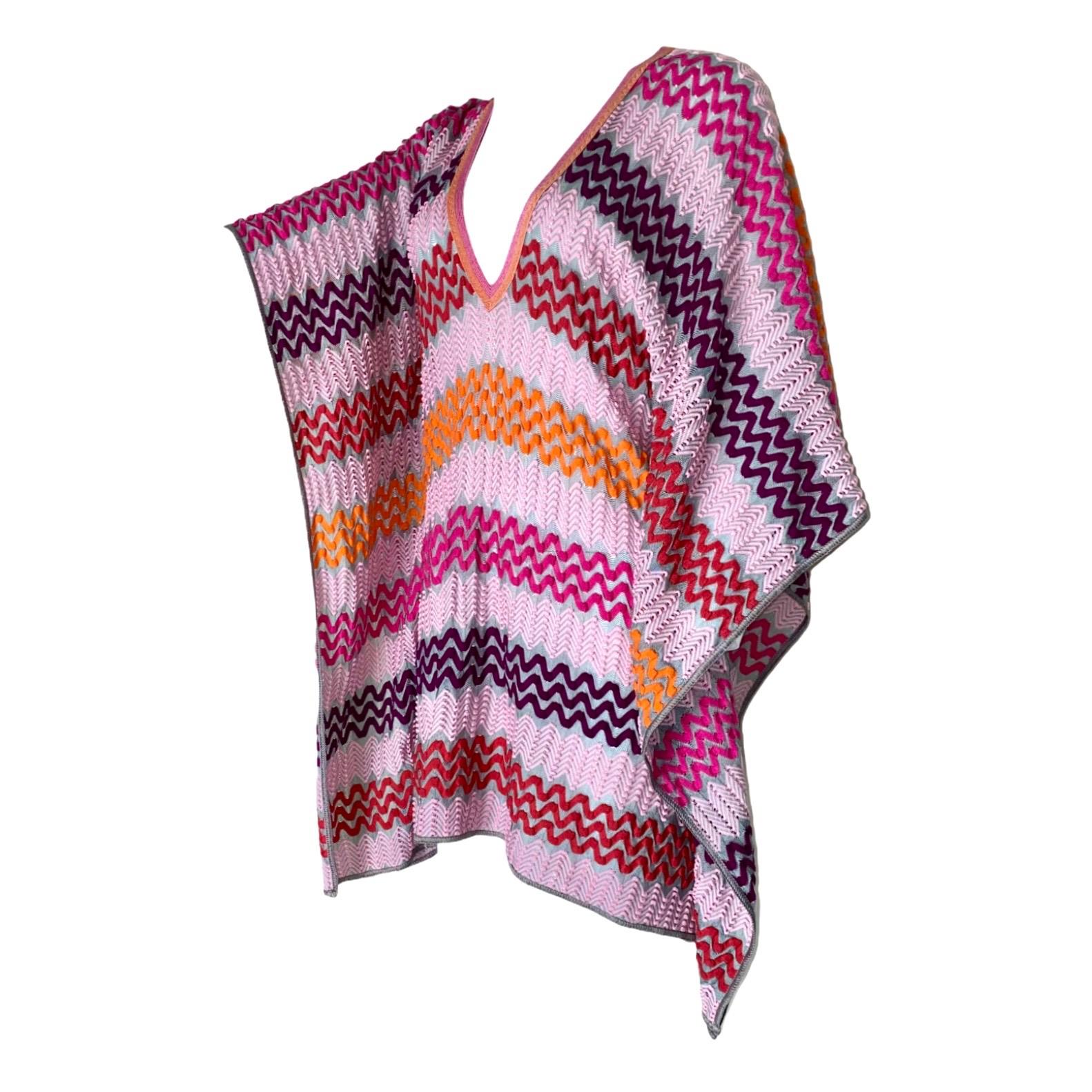 A signature Missoni knit caftan in a cascade of colors is the only piece you'll need this summer season

Multicolored knitted Missoni kaftan in beautiful pink colors
Plunging V-neckline
Simply slips on
Made in Italy
Dry Clean Only
Size S
New &