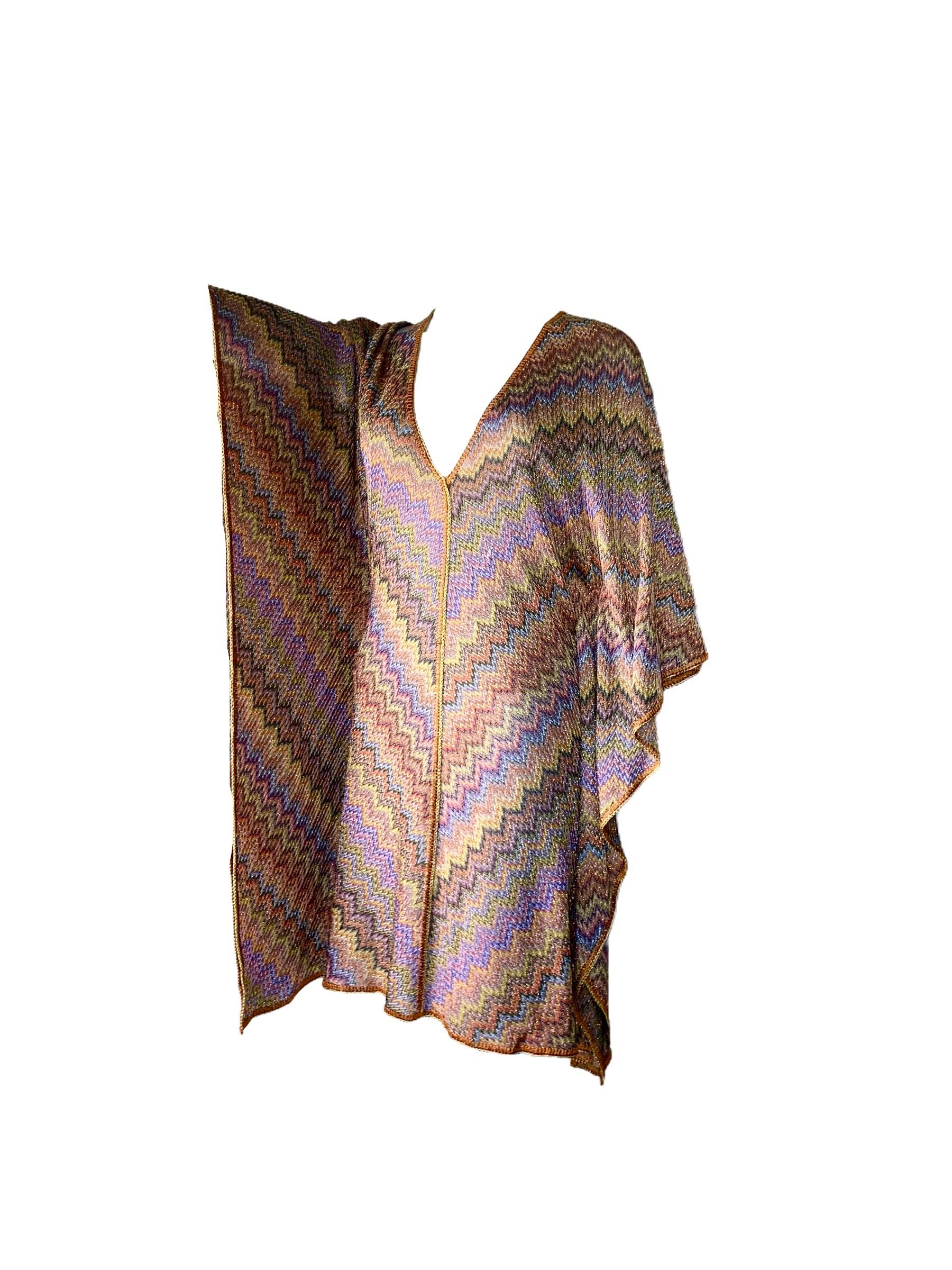     Beautiful multicolored lurex Missoni kaftan dress
    Classic Missoni signature knit
    Simply slips on
    Deep V-Neck
    Crochet-knit detail trimming
  Dry Clean only
    Made in Italy
Size 42


