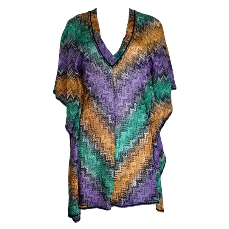 Beautiful multicolored lurex Missoni kaftan dress
Classic Missoni signature knit
Simply slips on
Deep V-Neck
Crochet-knit fringed trimmings
Dry Clean only
Made in Italy
Size 38
New, unworn

Please refer to AD for style reference only