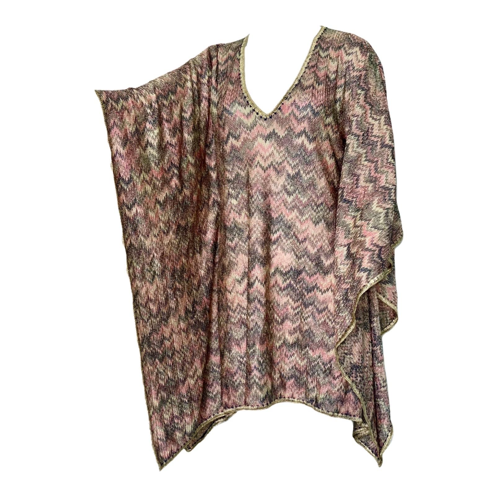 Beautiful multicolored lurex Missoni kaftan dress
Classic Missoni signature knit
Simply slips on
Golden crochet-knit detail trimming
Dry Clean only
Made in Italy
Size L
New



