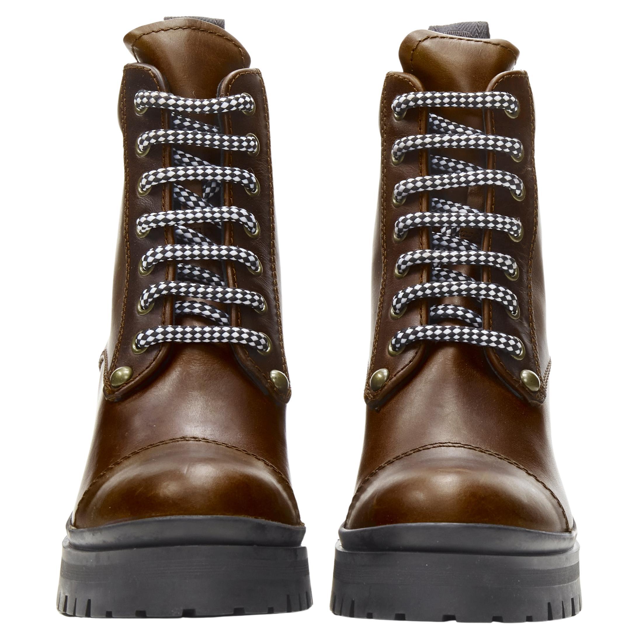 new MIU MIU 2019 Vintage brushed brown leather block heel Alpine boots EU36.5
Brand: Miu Miu
Designer: Miuccia Prada
Material: Leather
Color: Brown
Pattern: Solid
Closure: Lace Up
Extra Detail: Alpine boots. Brushed and scuffed cognac brown leather