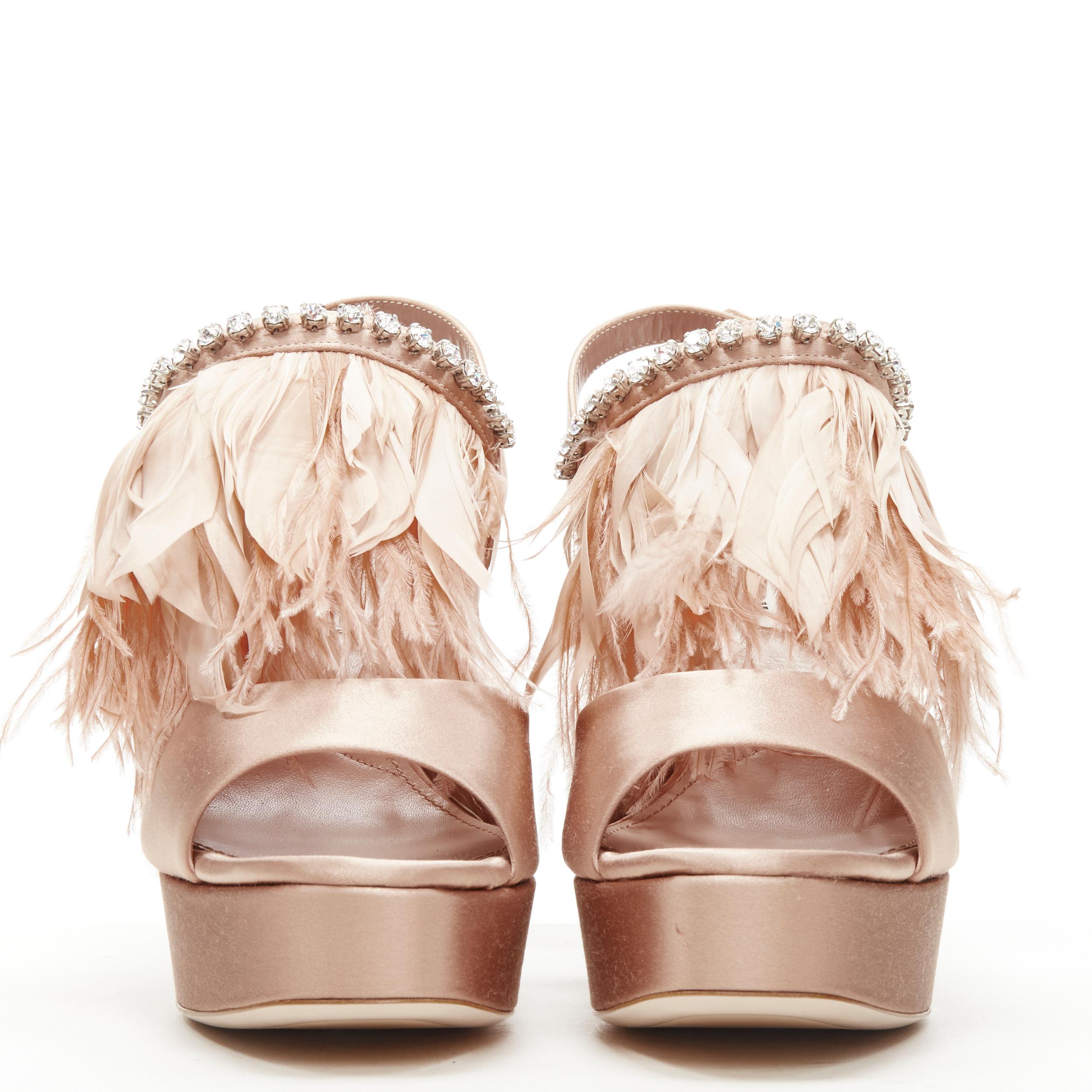 nude feather heels