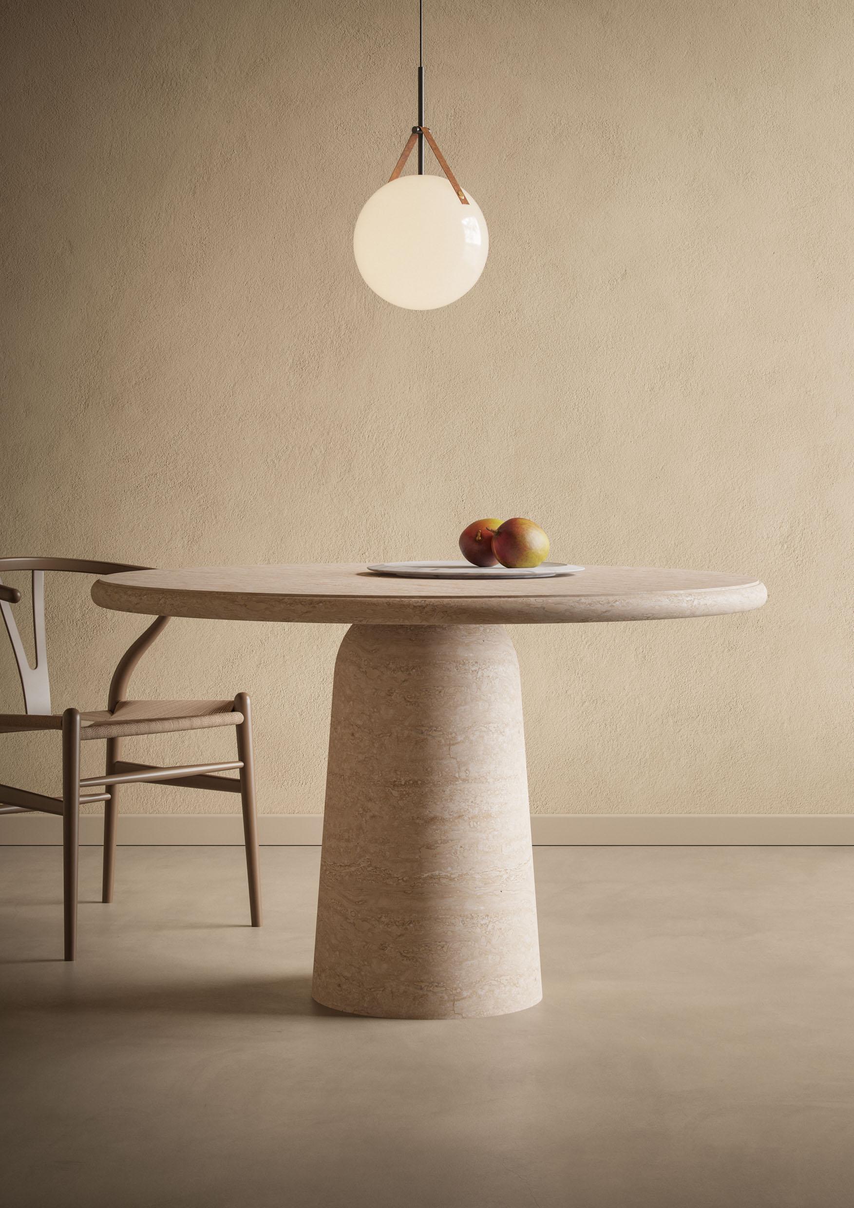Table de salle à manger en travertin
Taille : ⌀ 120 x 74,5 cm. - 47.2 x 29.3 in. 

Nom commercial : Table de salle à manger Nissa en travertin, Collection S/One du designer espagnol Ivan Colominas. Fabriqué en Italie, fini à la main.

- autres