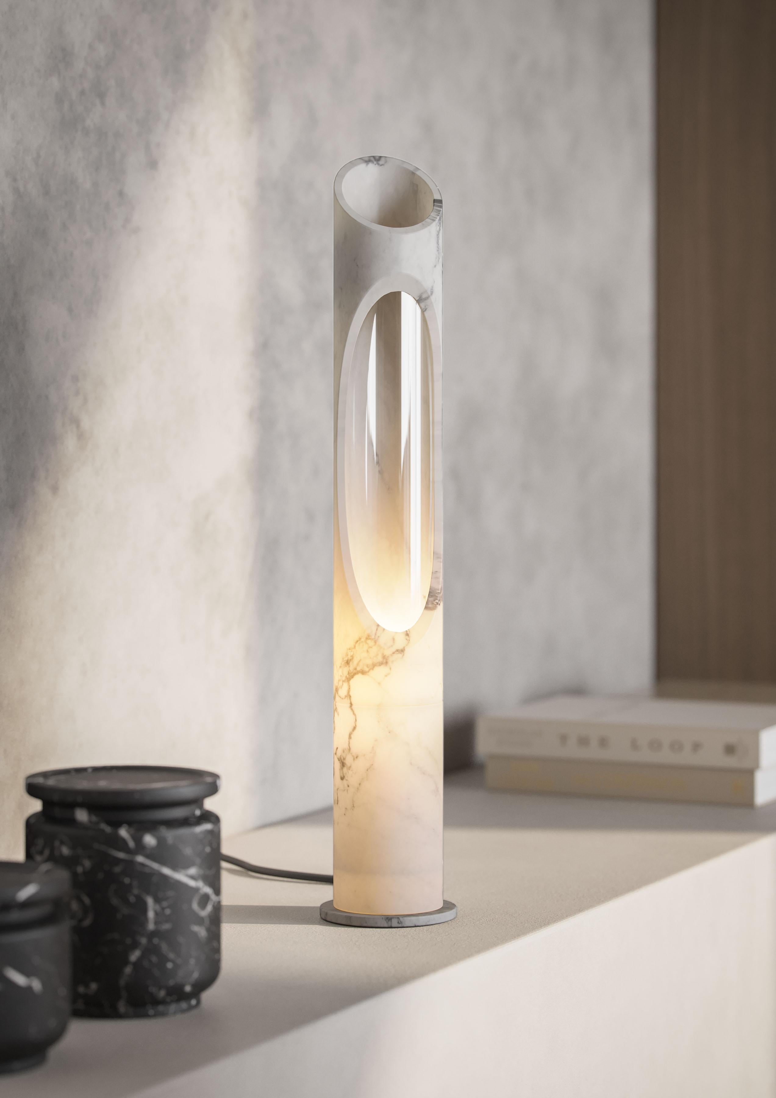 Lamp S in White Arabescato marble, designed by Jacopo Simonetti.
Available also in Pink Egeo, White Onyx, Black Marquinia marble and in the L version. 

Armonia Collection: Inspired by the captivating image that two contrasting elements can