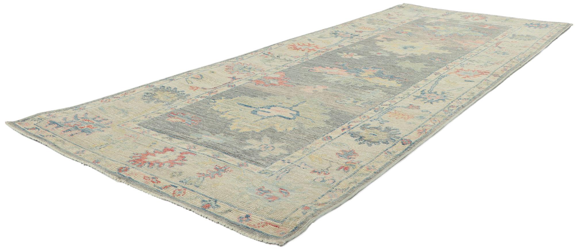 80857 new modern style oushak Runner with soft colors 03'01 x 08'01. Serene and sophisticated, this hand-knotted wool contemporary Contemporary Oushak runner beautifully embodies a modern style. The composition features an all-over botanical pattern
