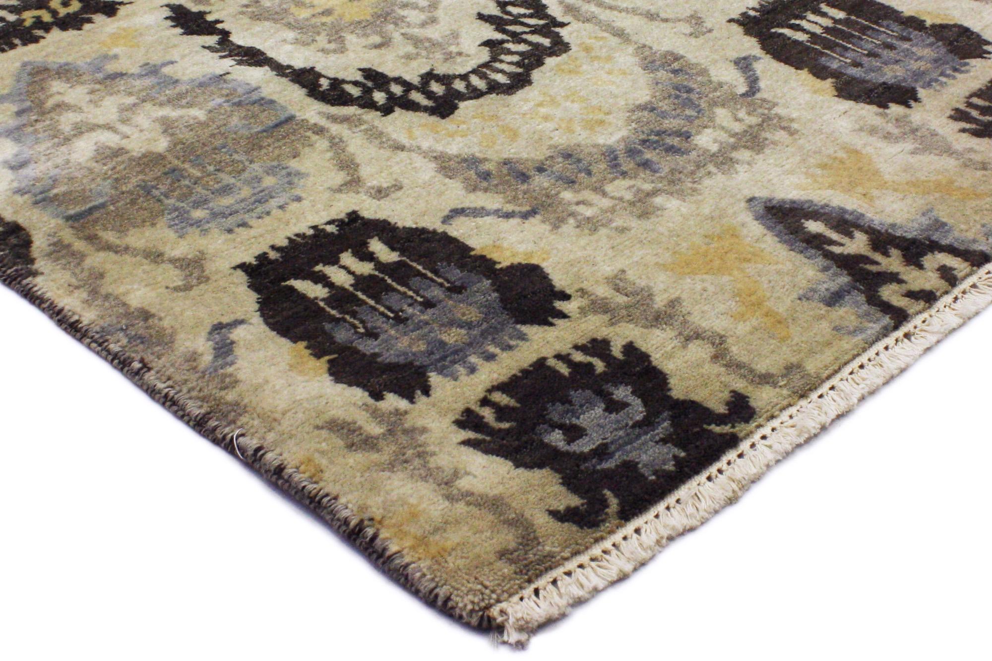 30292 New Modern Transitional Ikat Style Area Rug, 07'11 x 09'09. The warm ecru and beige colors and cool slate blue hues combined with this eye-catching Ikat pattern will make a major statement without visually overwhelming the room. The