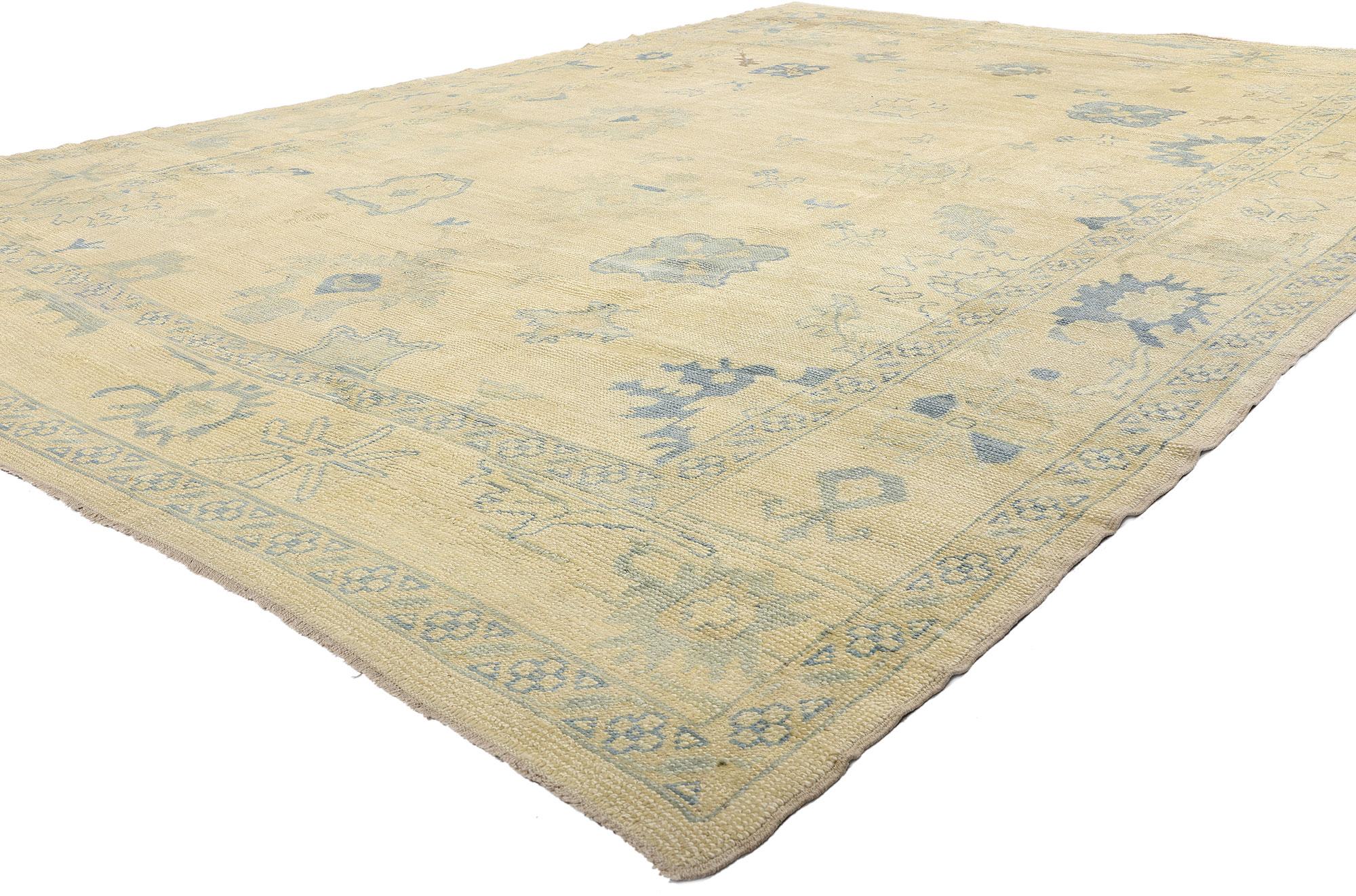 51611 New Modern Turkish Oushak Rug, 10’02 x 15'02. Woven with a whisper of tradition and a touch of modernity, this hand-knotted wool Turkish Oushak rug exudes a timeless grace. Its warm beige field, kissed by delicate hues of sky blue and soft