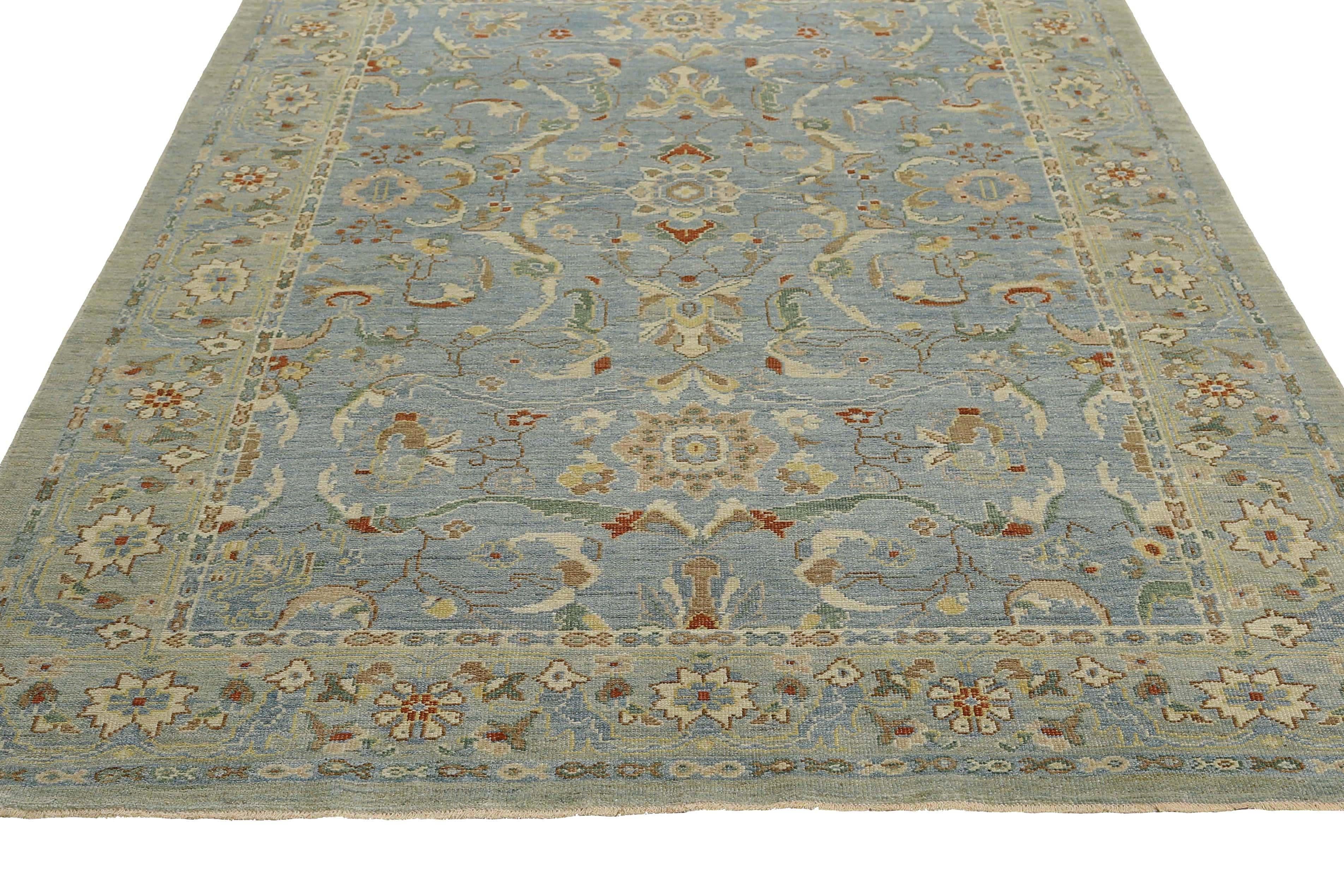 Wir stellen Ihnen unseren atemberaubenden handgefertigten türkischen Sultanabad-Teppich vor, der jetzt mit einem wunderschönen blauen Hintergrund erhältlich ist. Mit den Maßen 7'0'' x 9'6'' ist dieser Teppich die perfekte Ergänzung für jeden Raum in