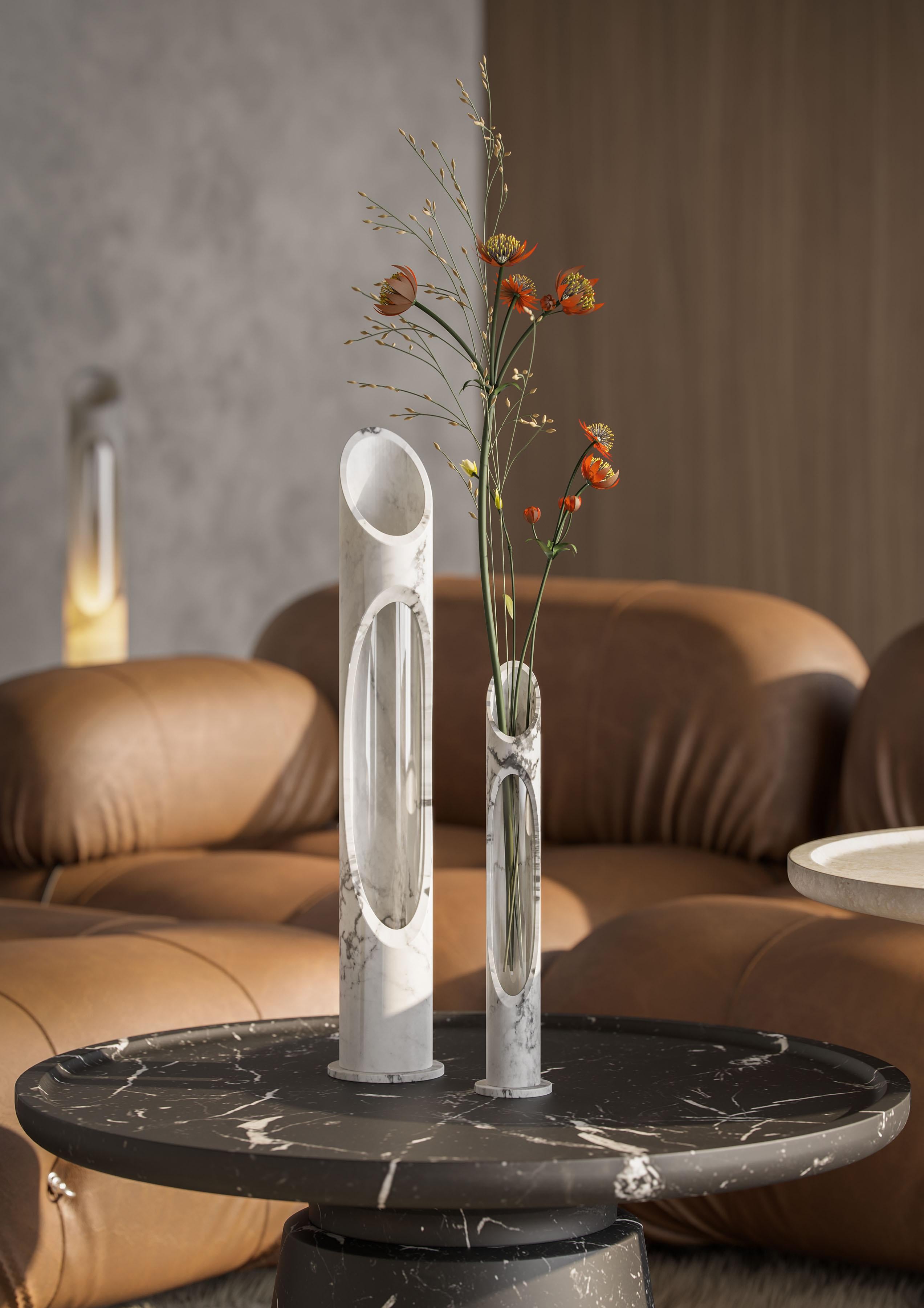 Vase L in White Arabescato marble, designed by Jacopo Simonetti.
Available also in Pink Egeo, Black Marquinia, White Onyx marble and in the S version. 

Armonia Collection: Inspired by the captivating image that two contrasting elements can