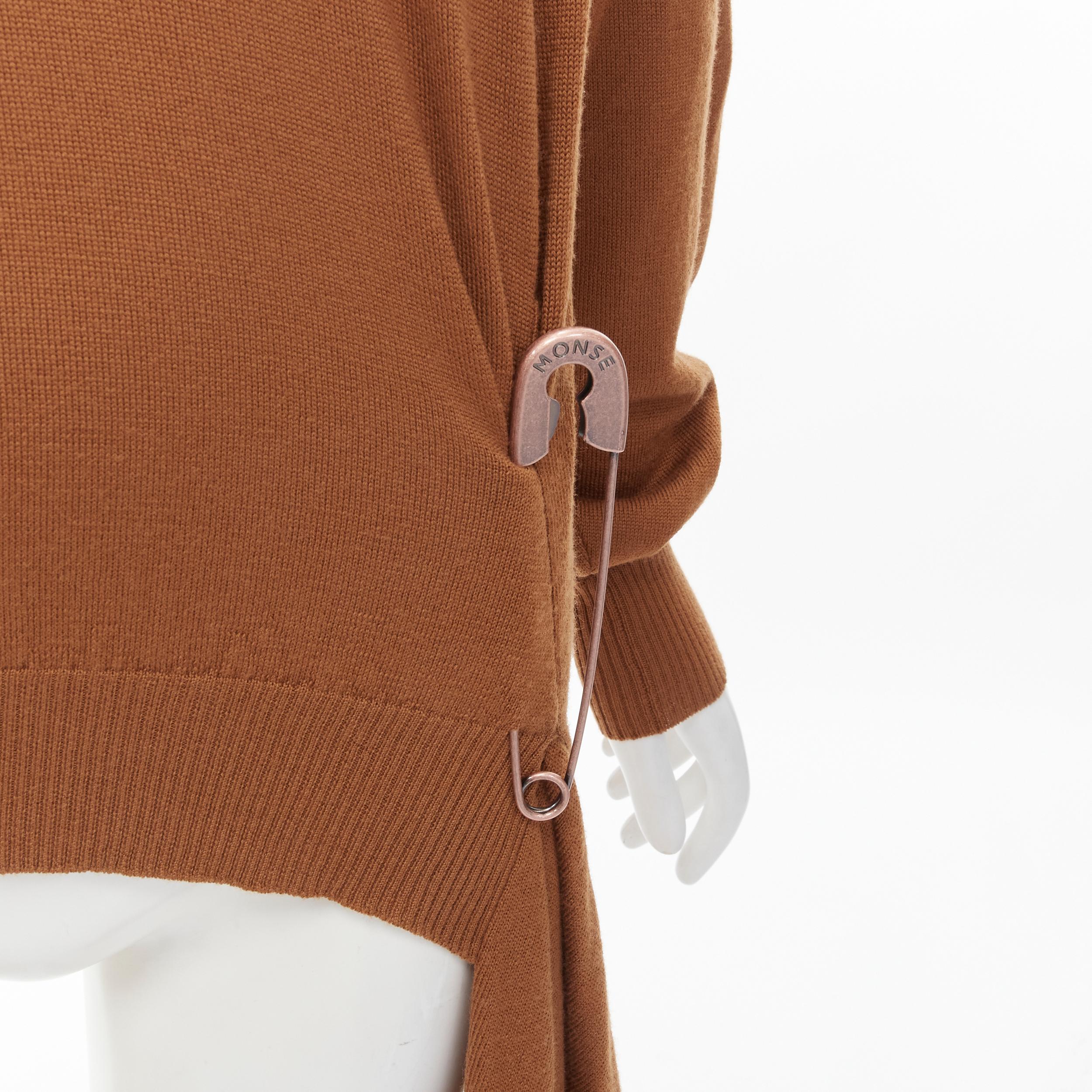 new MONSE brown 100% wool XL safety pin draped hem sweater M
Brand: Monse
Material: Wool
Color: Brown
Pattern: Solid
Extra Detail: Decorative detachable copper-tone XL metal safety pin at hem. Draped hem.
Made in: Italy

CONDITION:
Condition: New