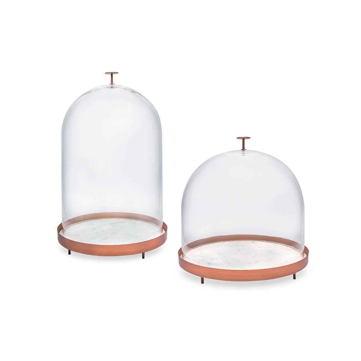 New Moon is a blown glass bell with a tray in Carrara marble and copper. This object is part of the Lunar Landscape collection designed by Elisa Ossino, who created a collection of tableware for Paola C., revisiting the classic themes of mise en