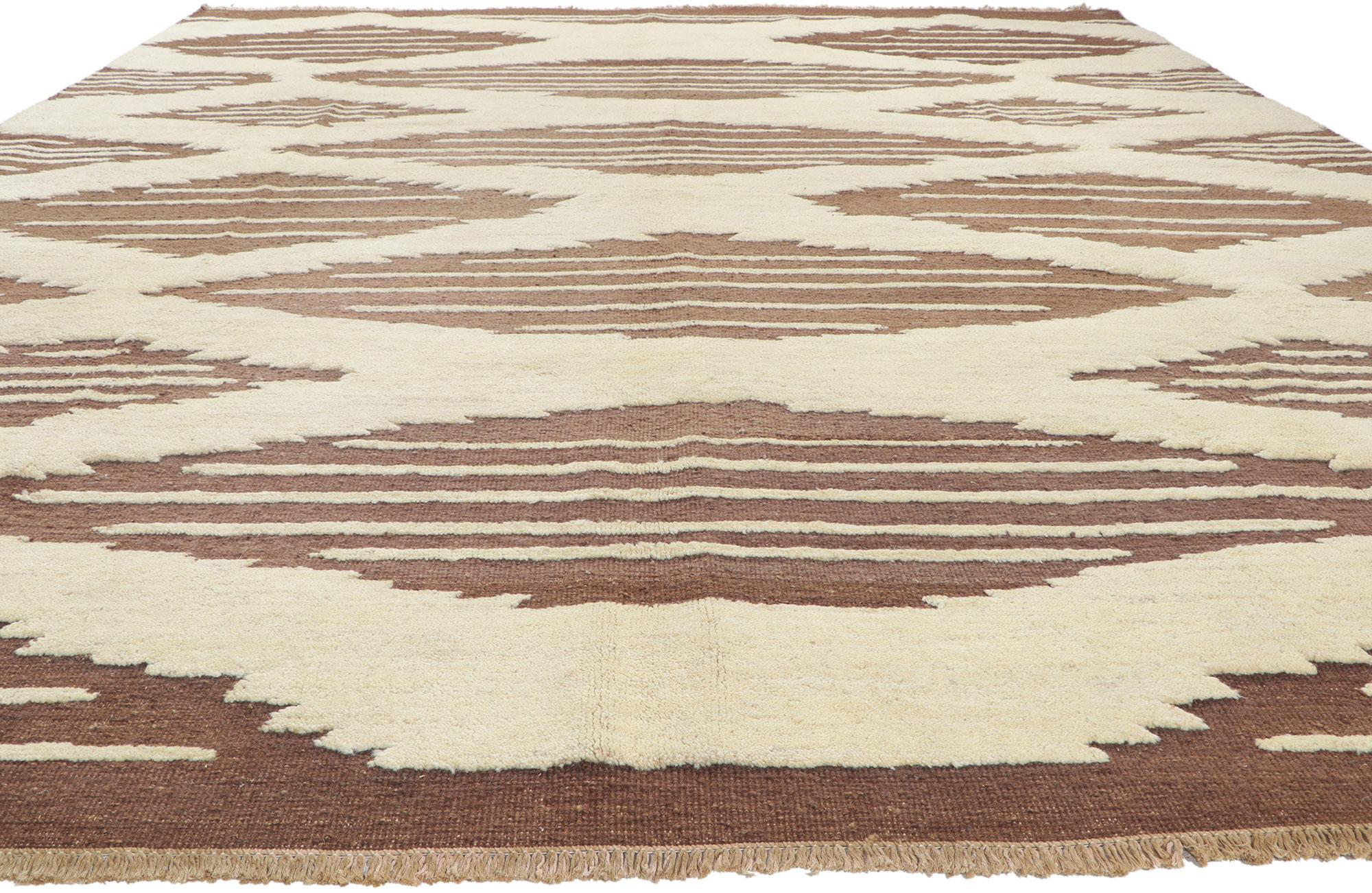 80373 New Moroccan High-Low Rug, 10'05 x 13'02.
Emanating nomadic charm with incredible detail and texture, this Moroccan high-low rug is a captivating vision of woven beauty. The raised beige Navajo design and earthy colorway woven into this piece
