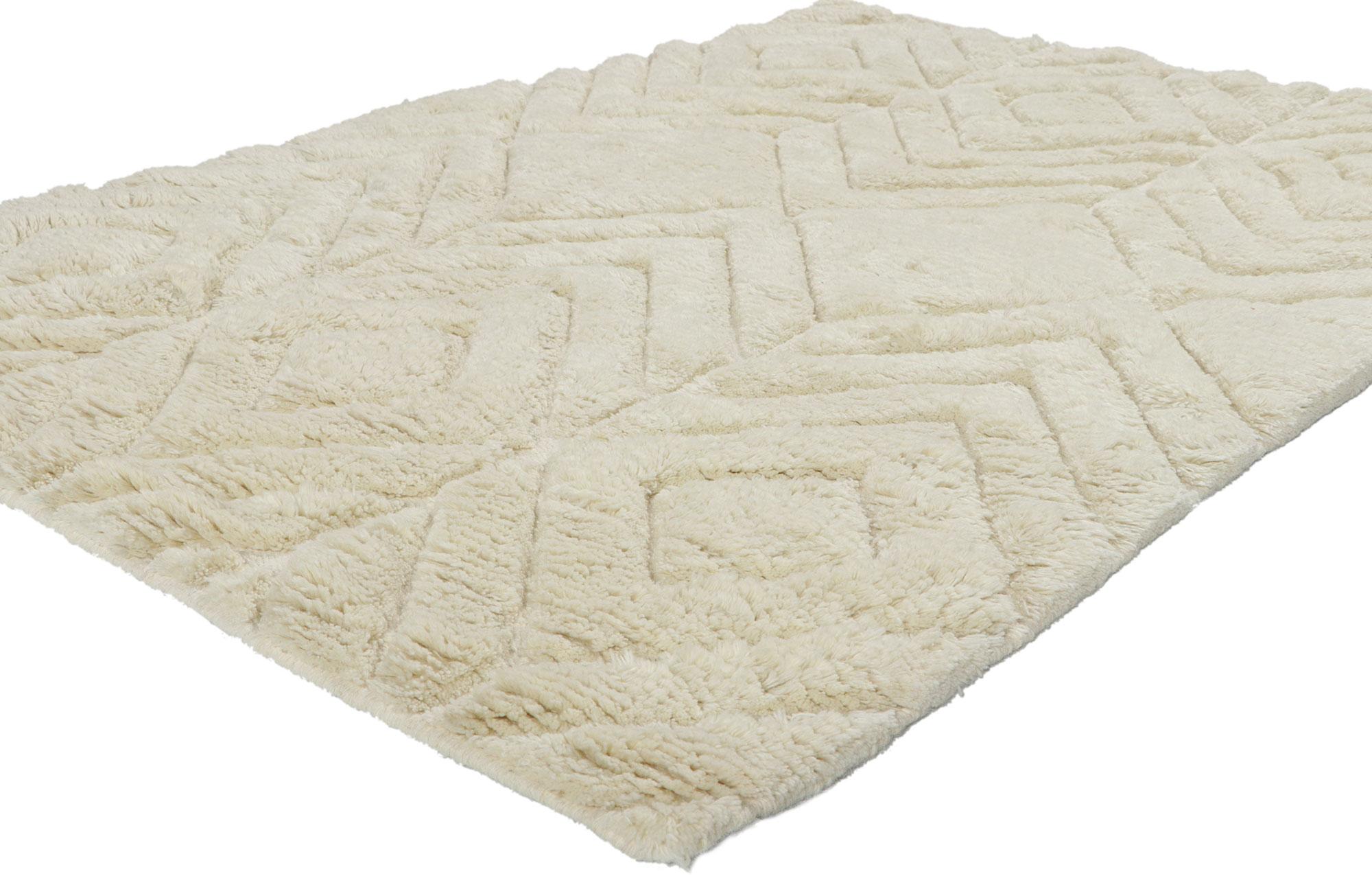 30905 New Moroccan style high-low ivory rug, 04'02 x 06'00. With its simplicity, plush pile, incredible detail and texture, this hand knotted wool contemporary Moroccan rug is a captivating vision of woven beauty. The abrashed field features an