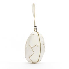 new MOSCHINO CHEAP AND CHIC Flintstone white leather cracked egg wristlet clutch