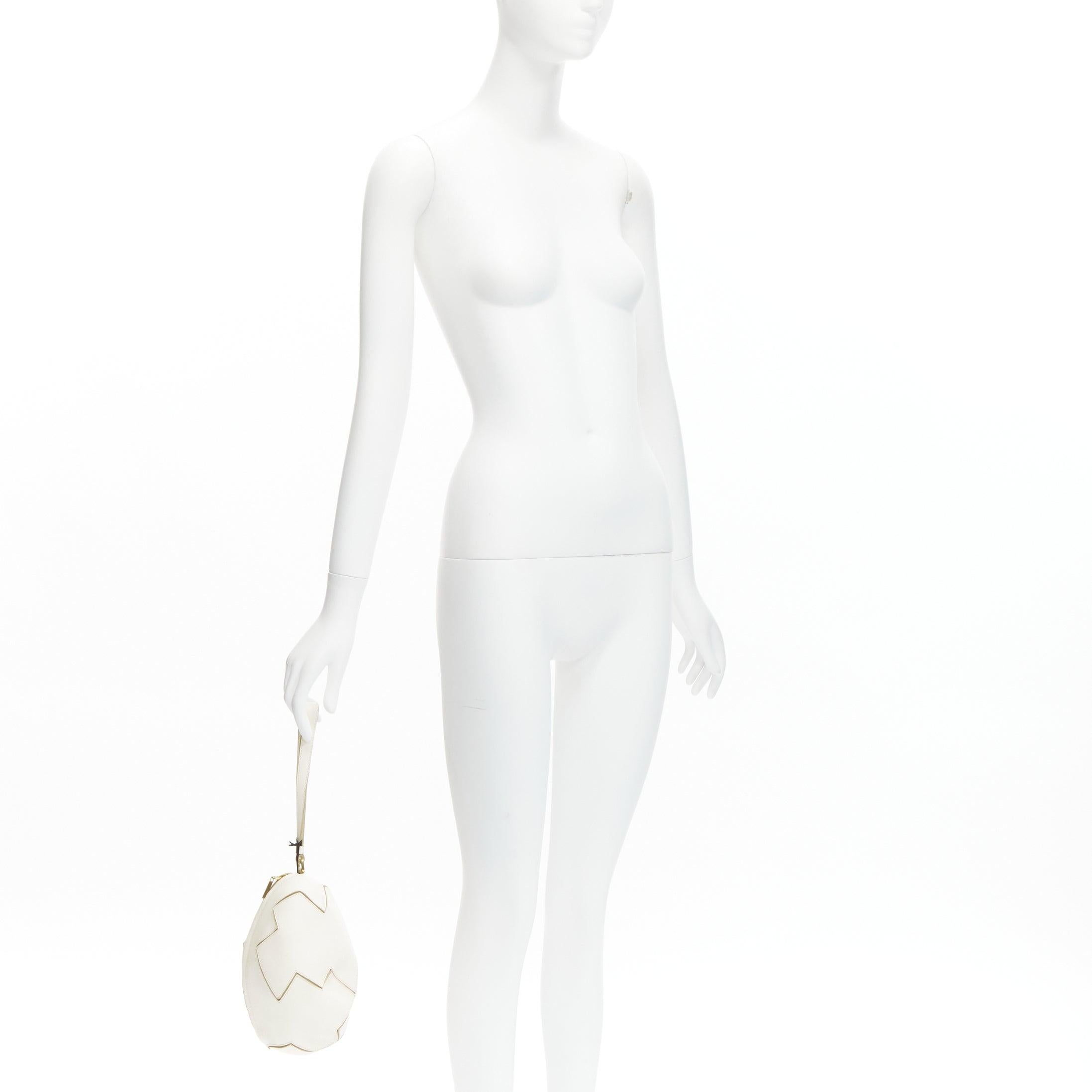White new MOSCHINO CHEAP AND CHIC Flintstone white leather cracked egg wristlet clutch
