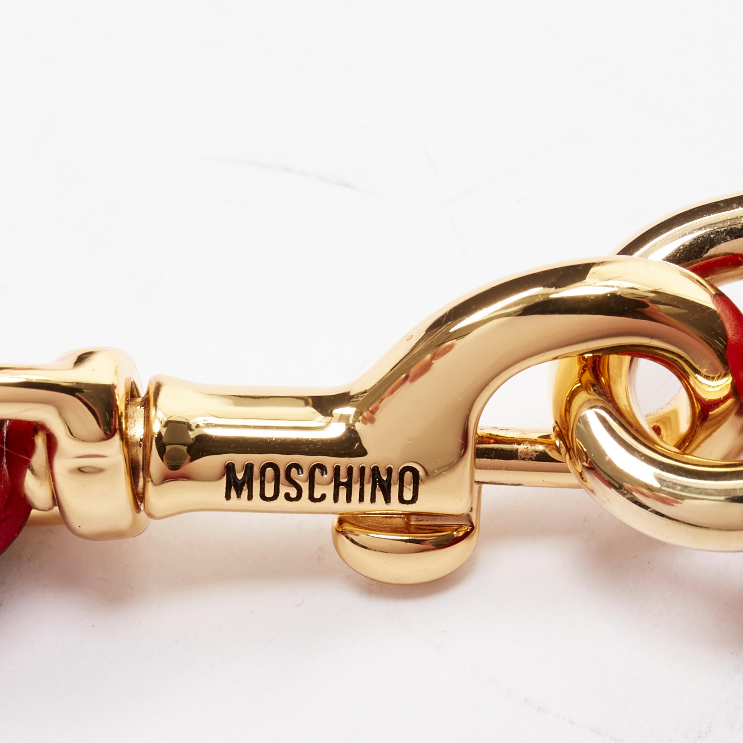 MOSCHINO Couture! glänzendes rotes Leder mit goldenem M-Reißverschluss am Handgelenk im Angebot 1