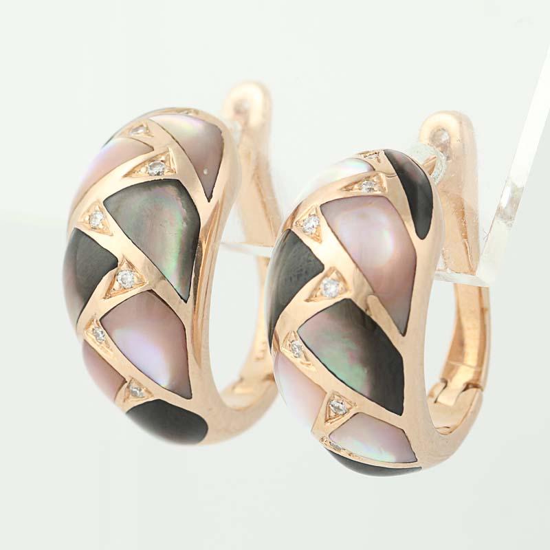As bright as her smile and sweet as her love, this radiant NEW pair of earrings by Kabana will be the perfect surprise gift for your special someone! Crafted in 14k rose gold, these tapered J-hoop earrings showcase luminous mother of pearl and