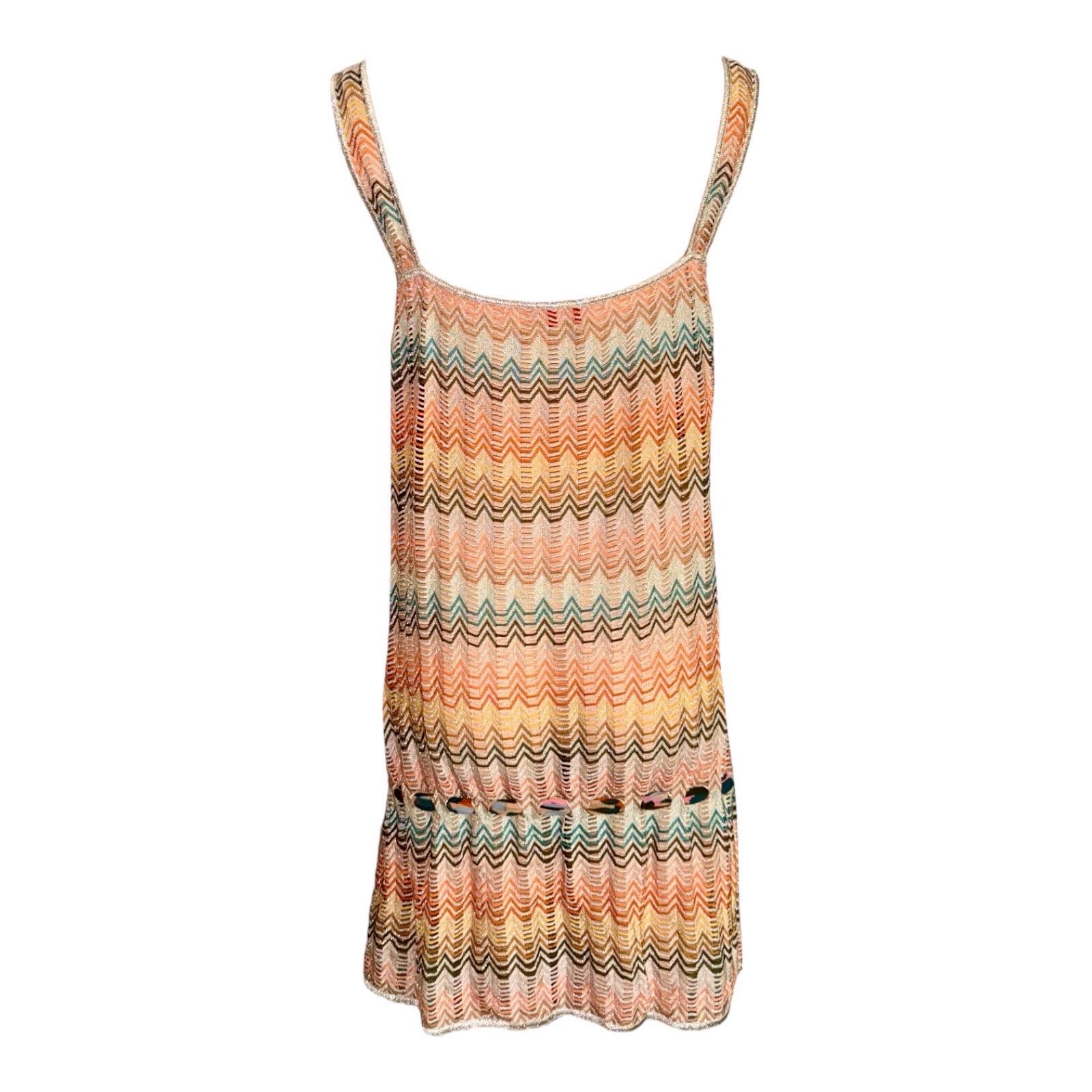 This multicolored sheer knit dress with lurex flecks from Missoni is a glamorous vacation piece. Combined with a floppy hat and statement sandals, this dress will lend a laidback look to your beachwear. Dress it up with heels for a fabulous night