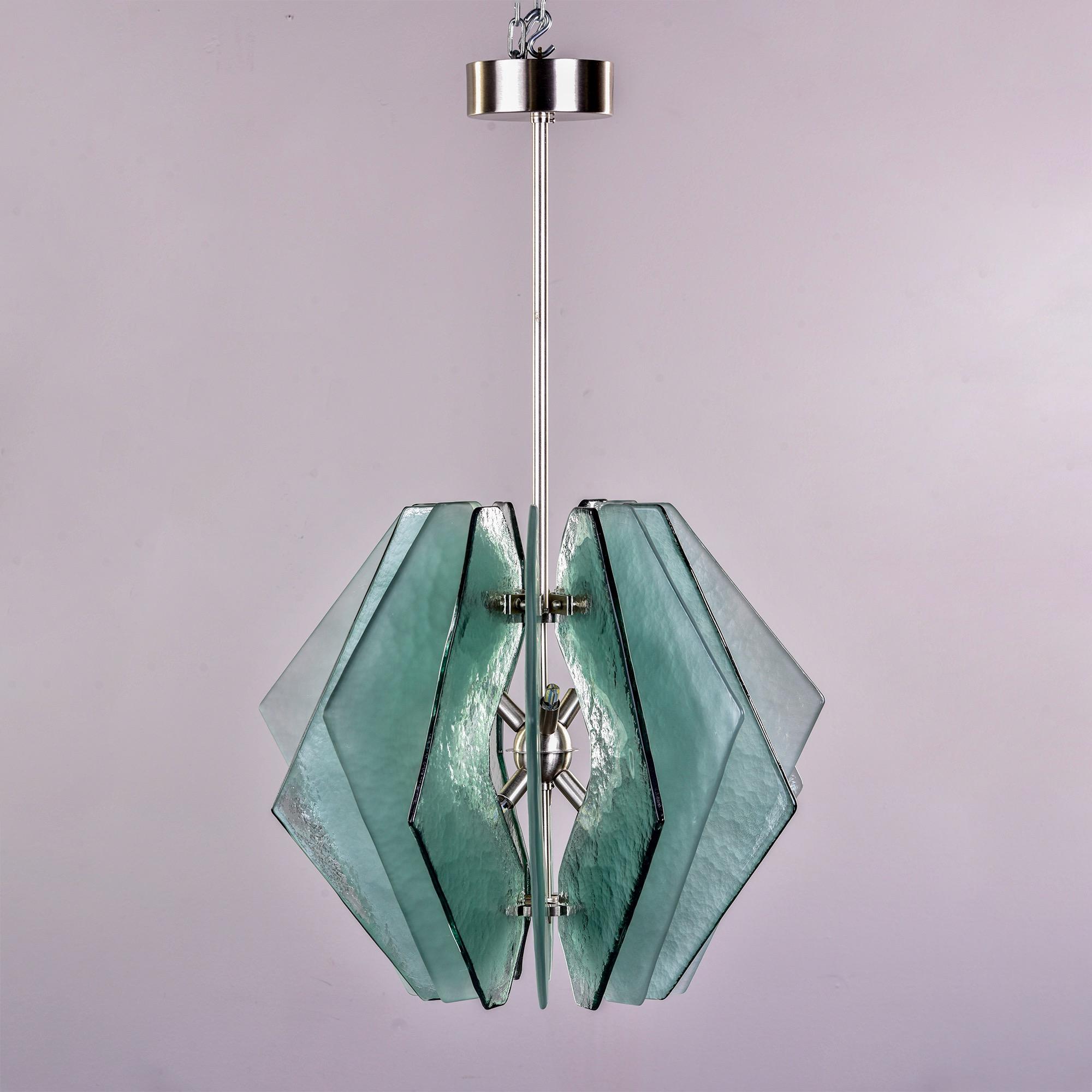 New chandelier made in Italy with Murano glass panels. Polished chrome hardware and canopy, six light fixture with heavy textured bottle green colored glass panels arranged so that the glossy and satin finishes alternate. 

Fixture Only: 19.5”